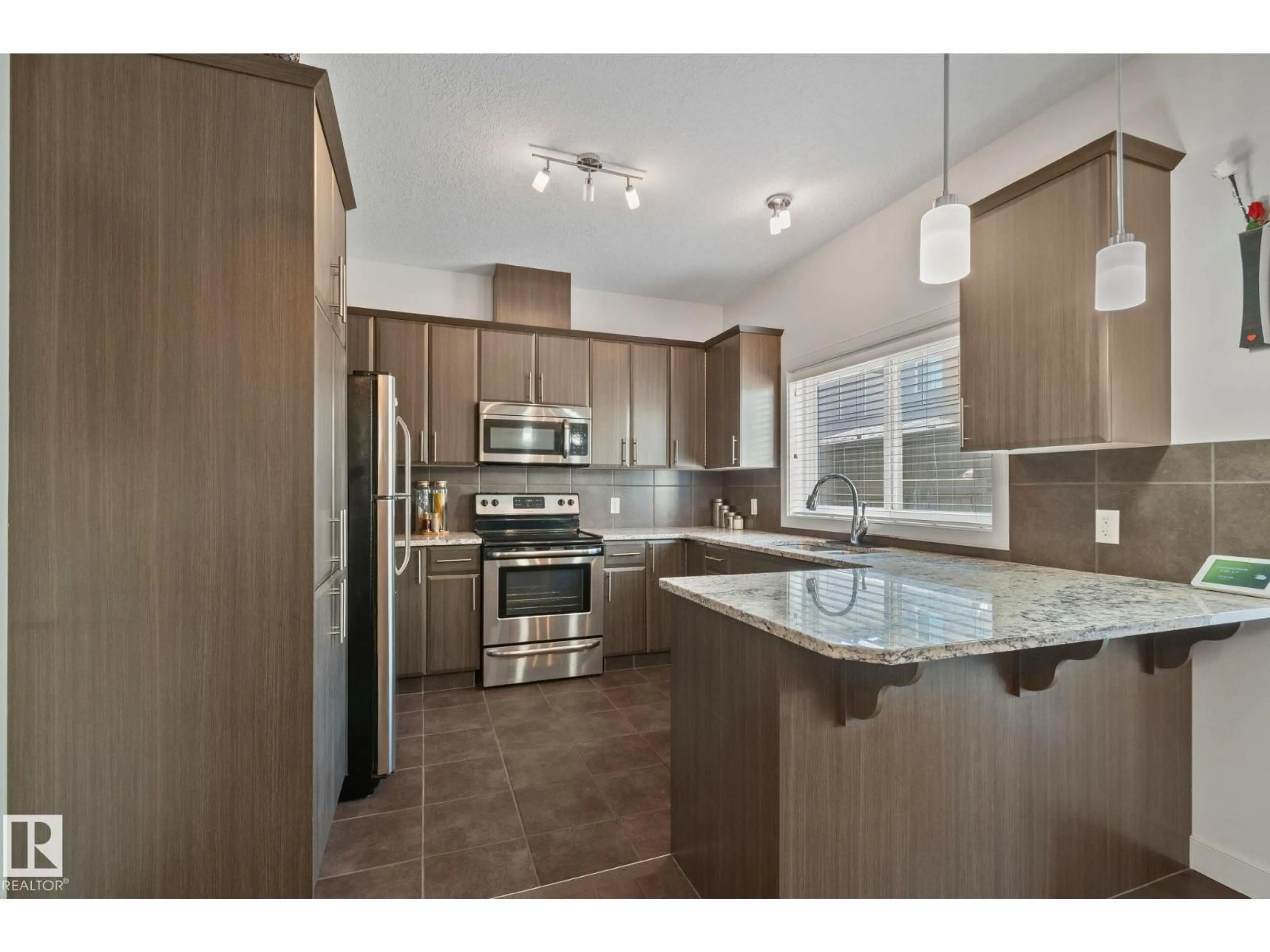 Open concept kitchen, unknown for 17 - 450 MCCONACHIE WY, Edmonton Alberta T5Y0S8