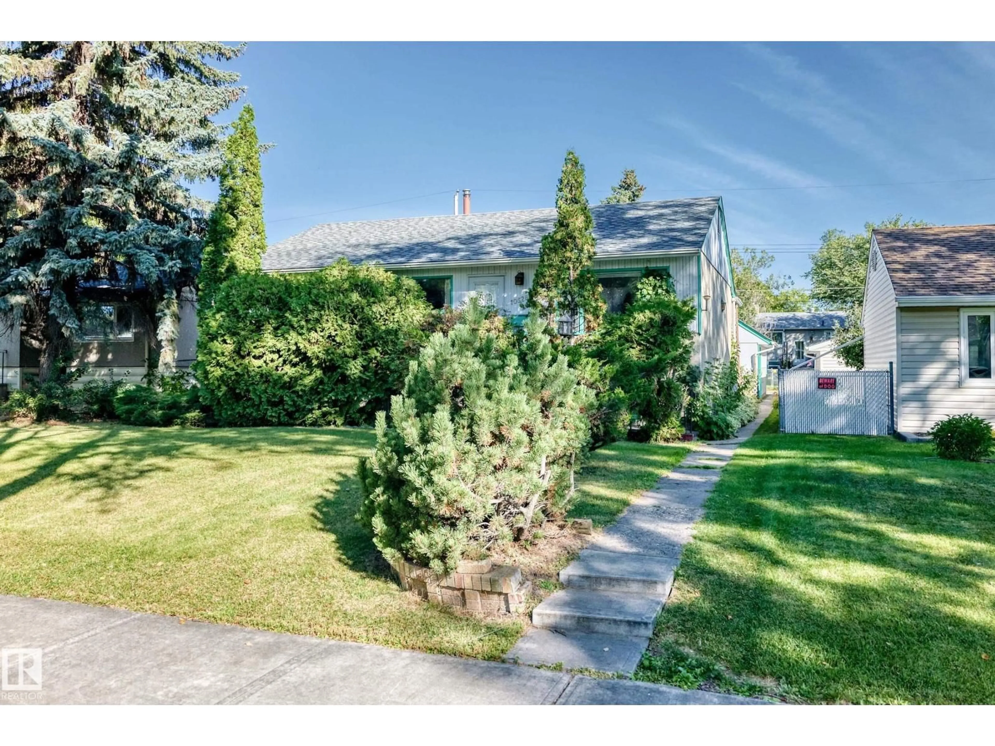 A pic from outside/outdoor area/front of a property/back of a property/a pic from drone, street for 10528 128 AV, Edmonton Alberta T5E0J3