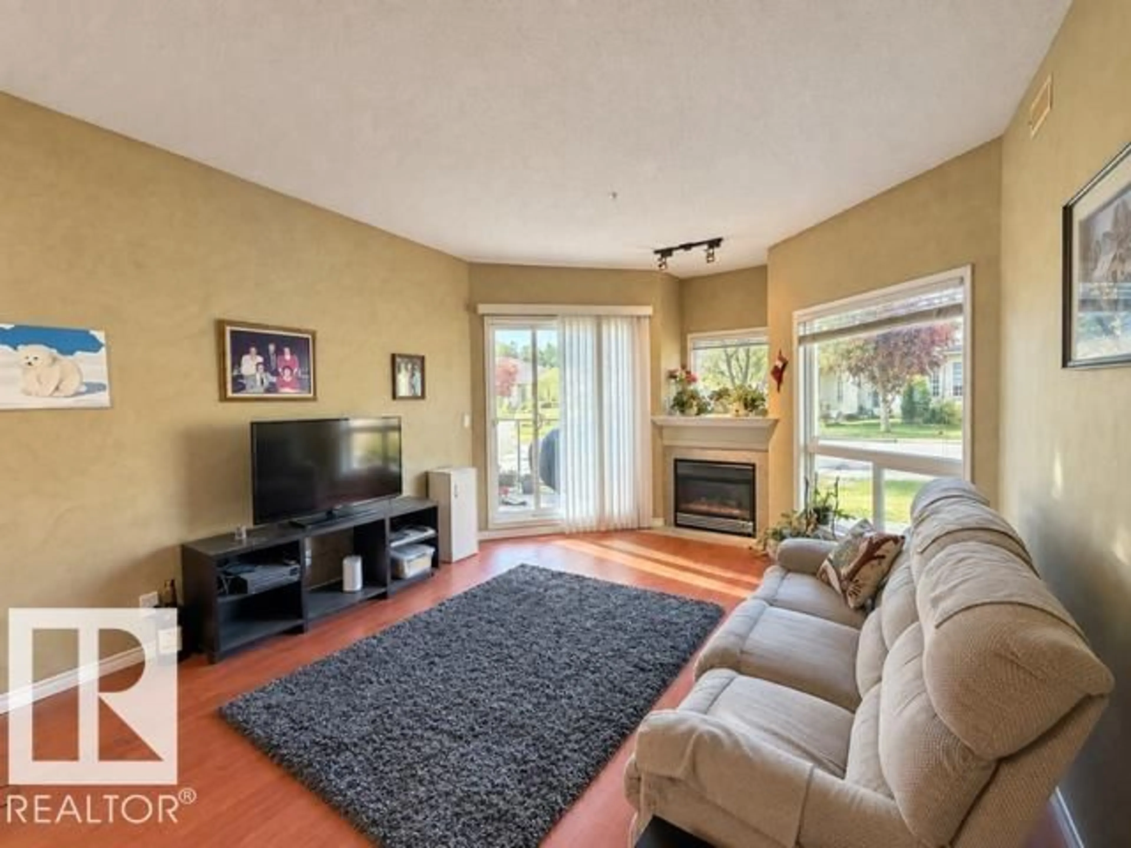 Living room with furniture, unknown for 102A - 102 BRIDGEPORT CX, Leduc Alberta T9E8K8