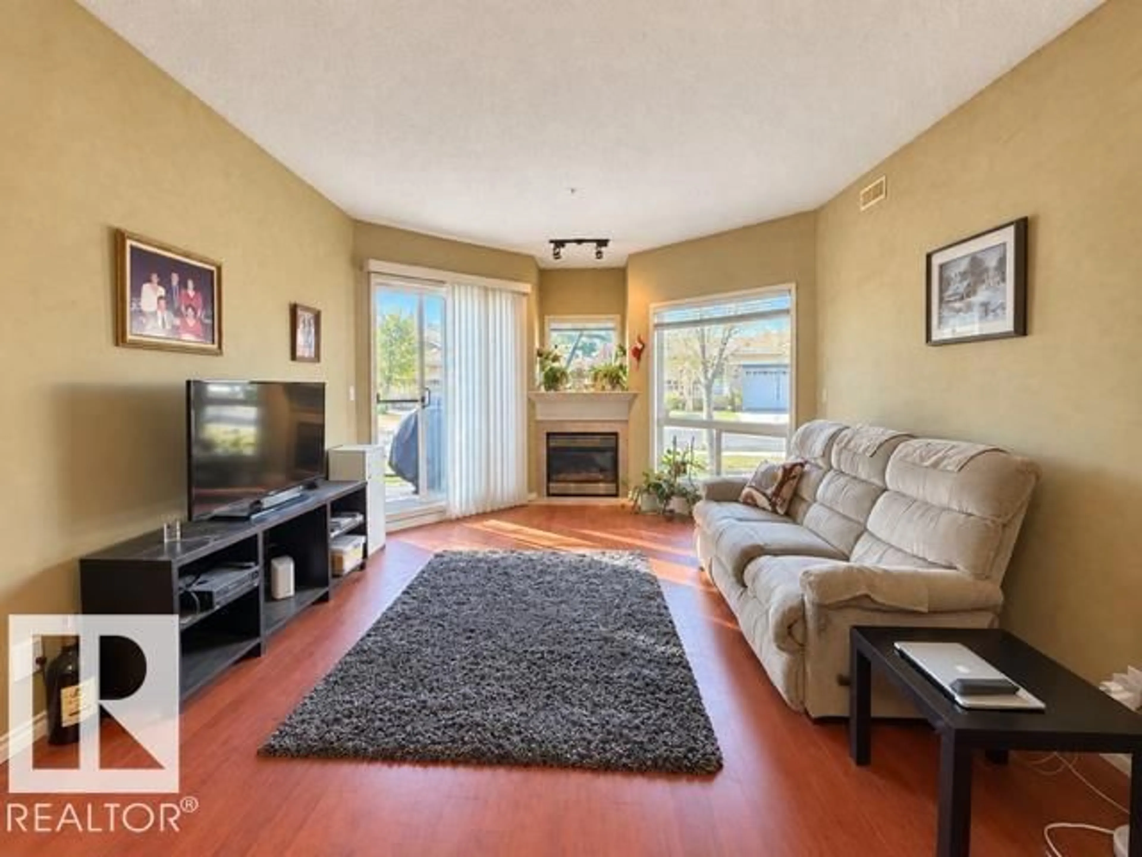 Living room with furniture, unknown for 102A - 102 BRIDGEPORT CX, Leduc Alberta T9E8K8