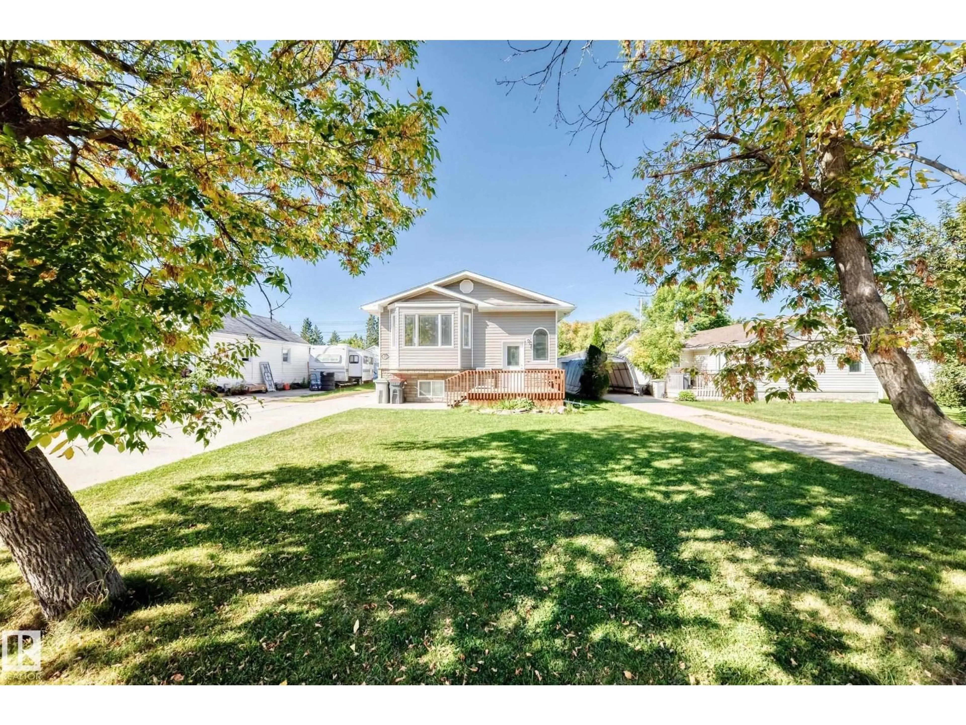 A pic from outside/outdoor area/front of a property/back of a property/a pic from drone, street for 5226 52 ST, Thorsby Alberta T0C2P0