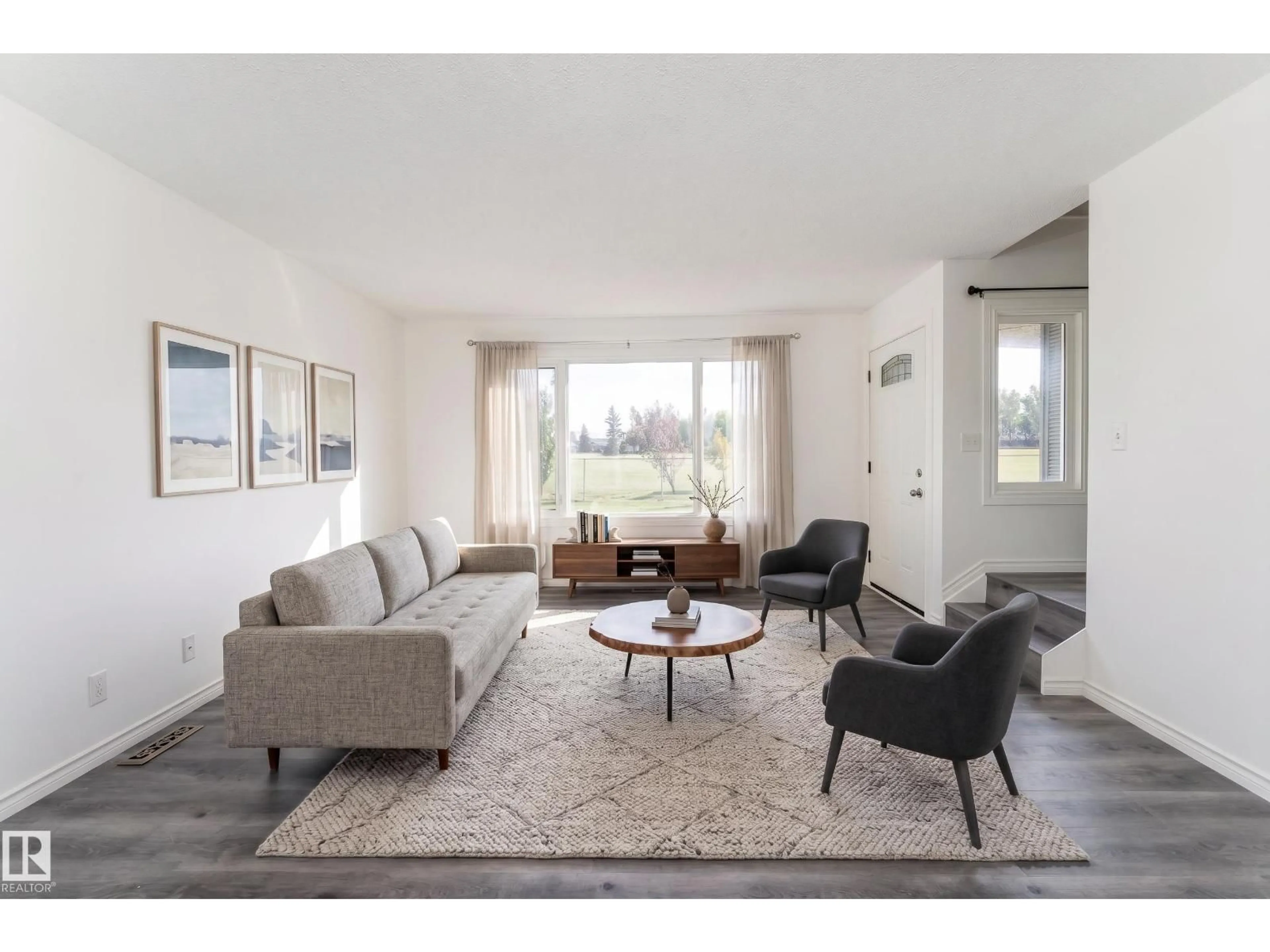 Living room with furniture, unknown for 11363 22 AV, Edmonton Alberta T6J4V8