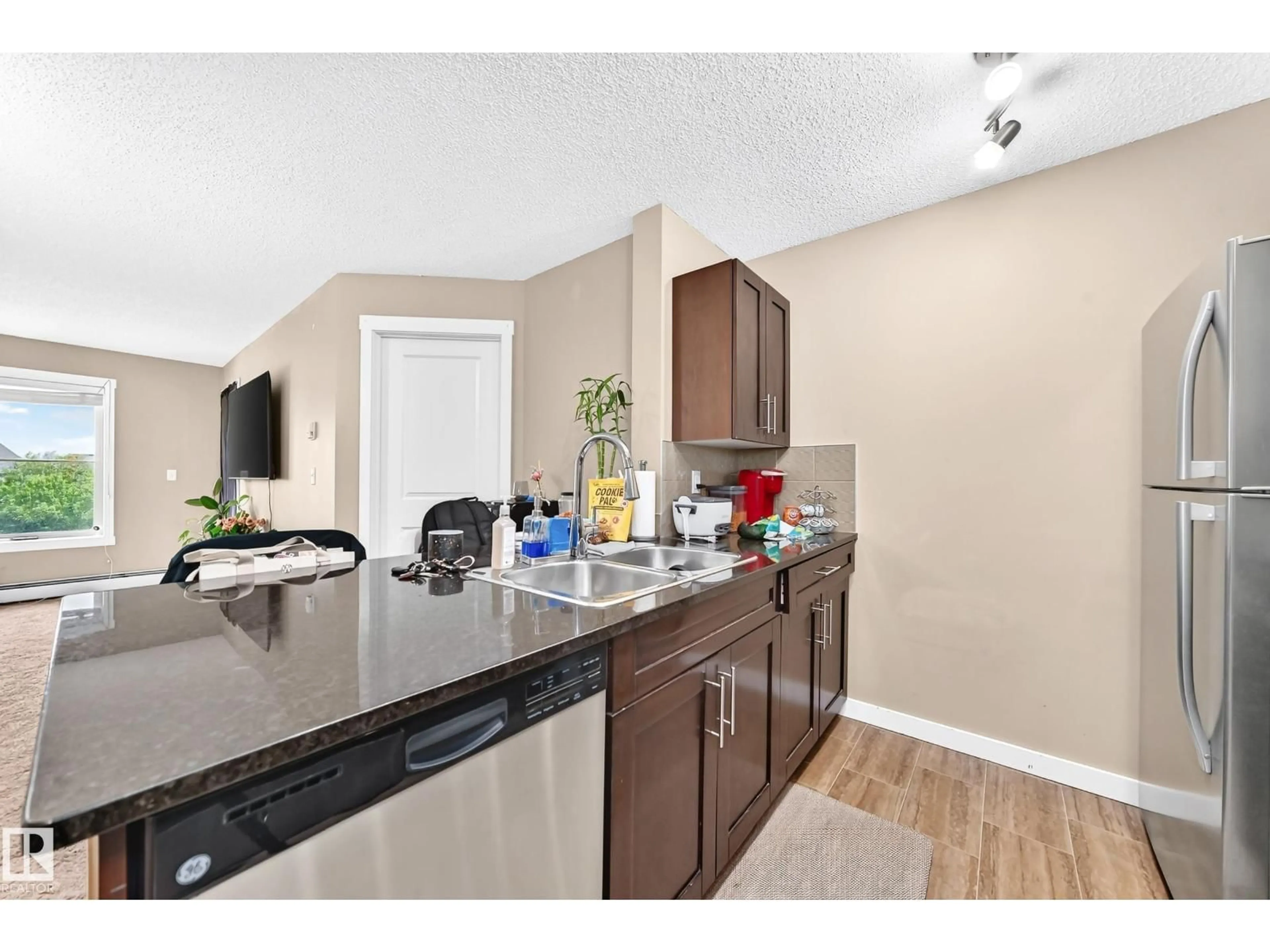 Open concept kitchen, unknown for #306 - 5370 CHAPPELLE RD, Edmonton Alberta T6W3L5