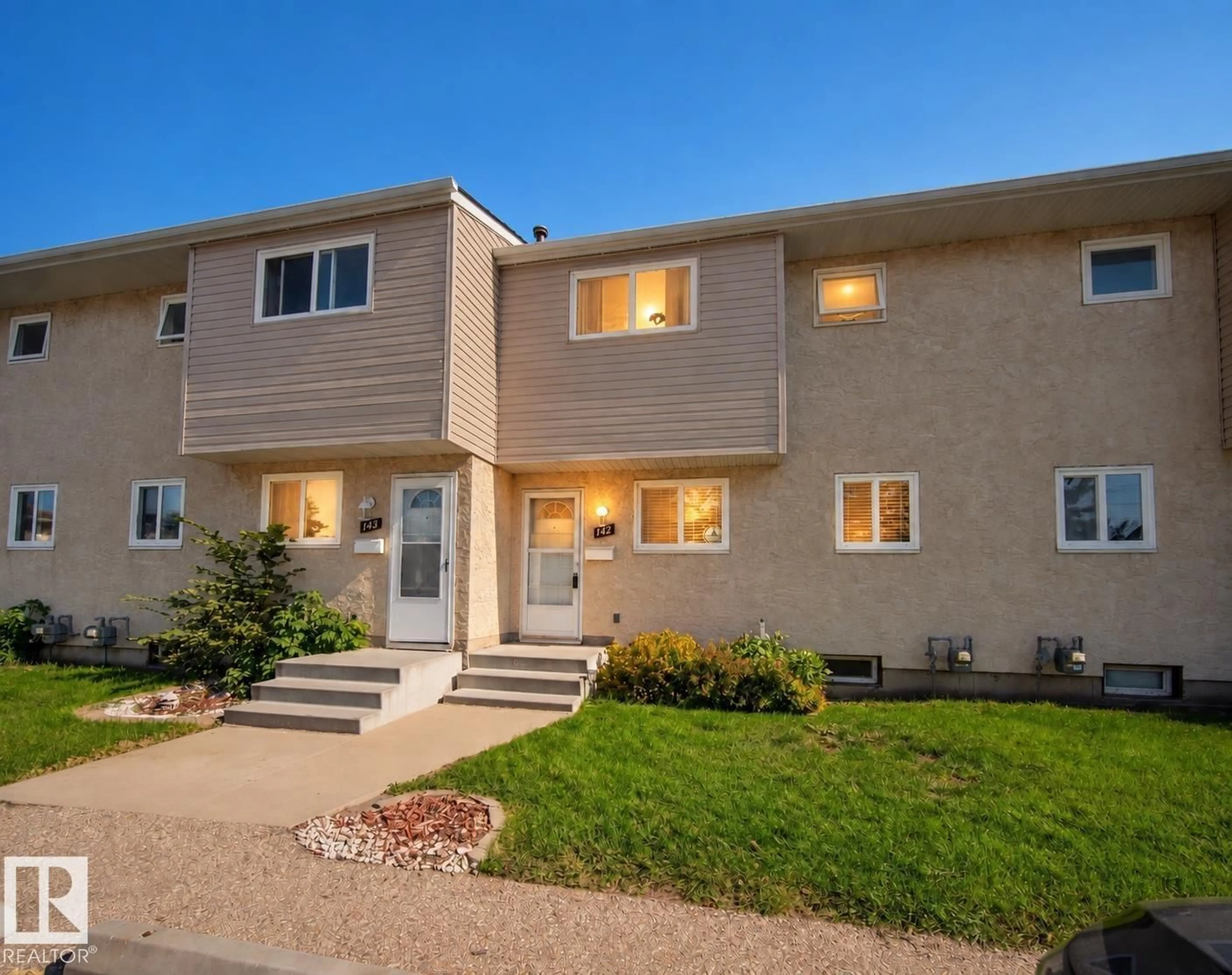 Home with vinyl exterior material, street for #142 - 5231 51 ST, Bon Accord Alberta T0A0K0
