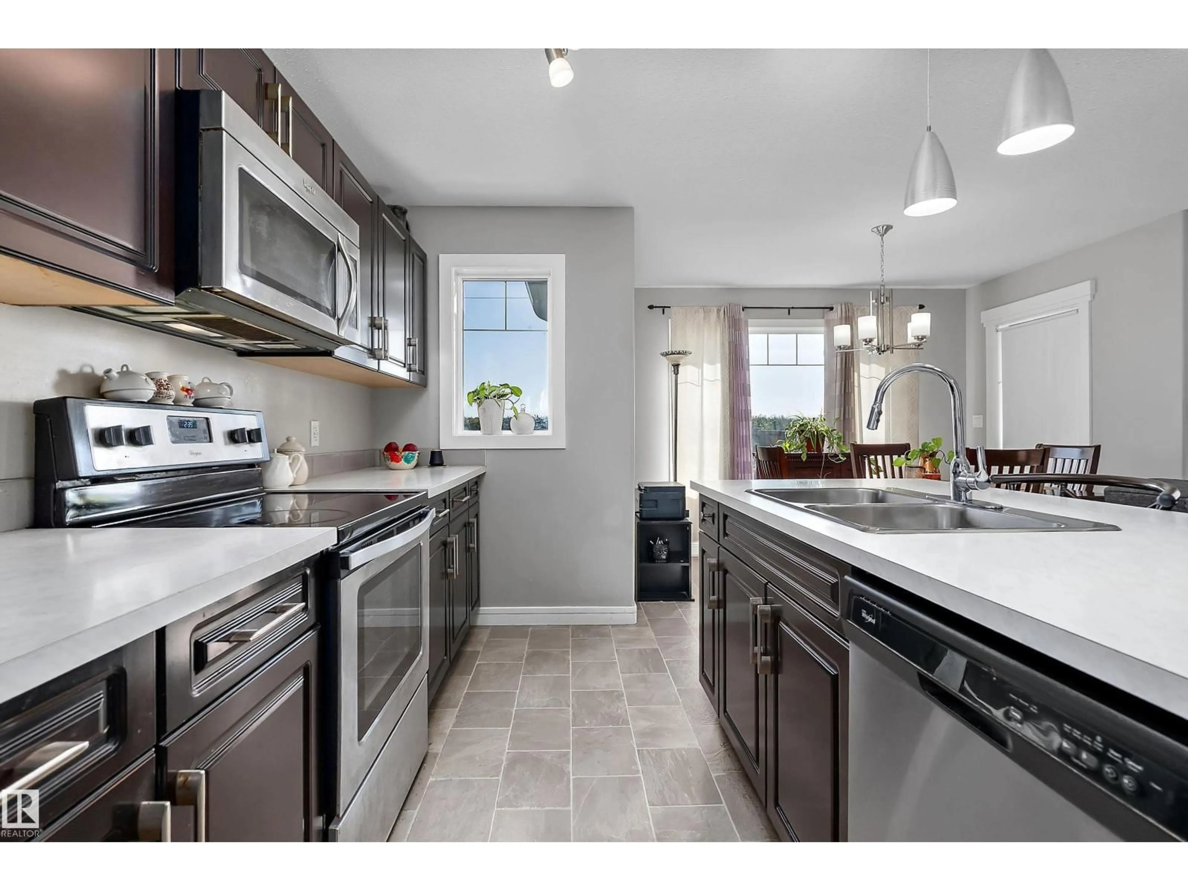 Open concept kitchen, ceramic/tile floor for 7 SANDALWOOD PL, Leduc Alberta T9E1C2