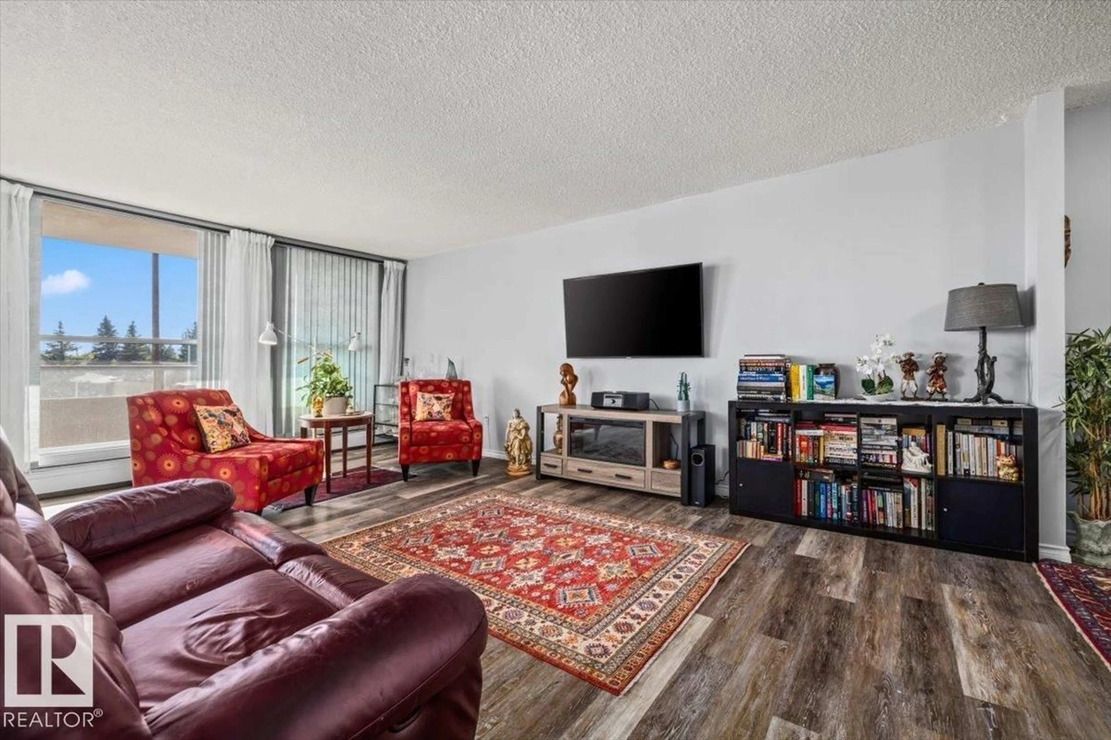 Living room with furniture, unknown for 210 STONY PLAIN RD, Edmonton Alberta T5N3R2