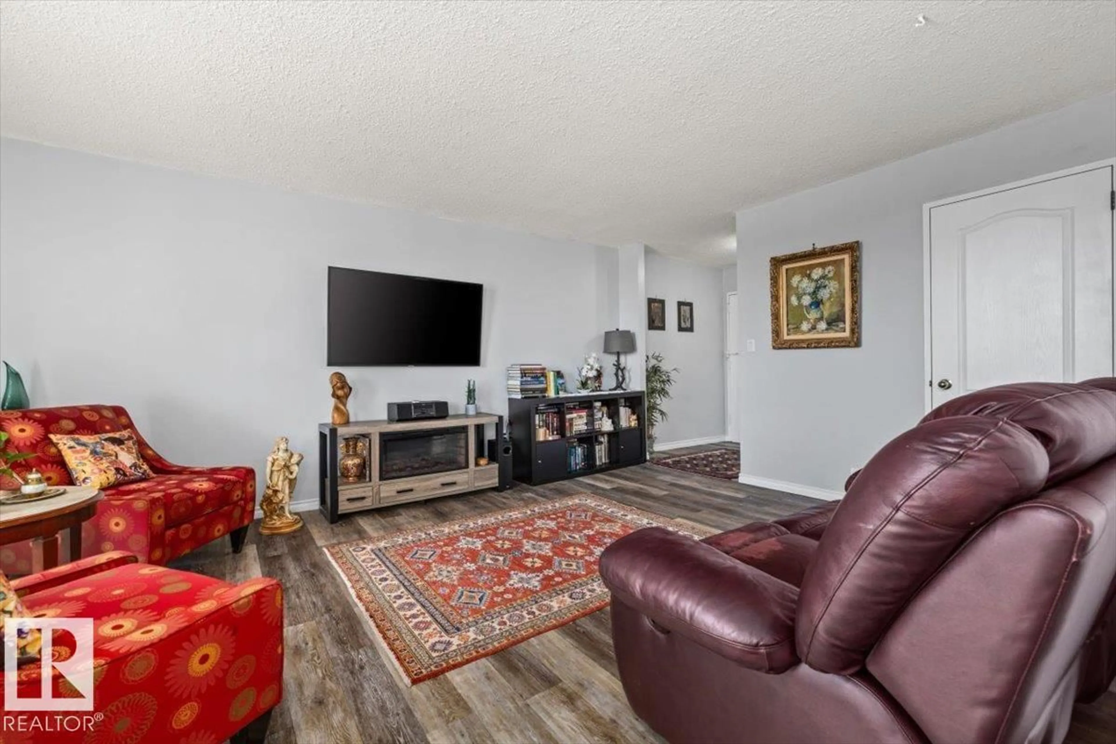 Living room with furniture, unknown for 210 STONY PLAIN RD, Edmonton Alberta T5N3R2