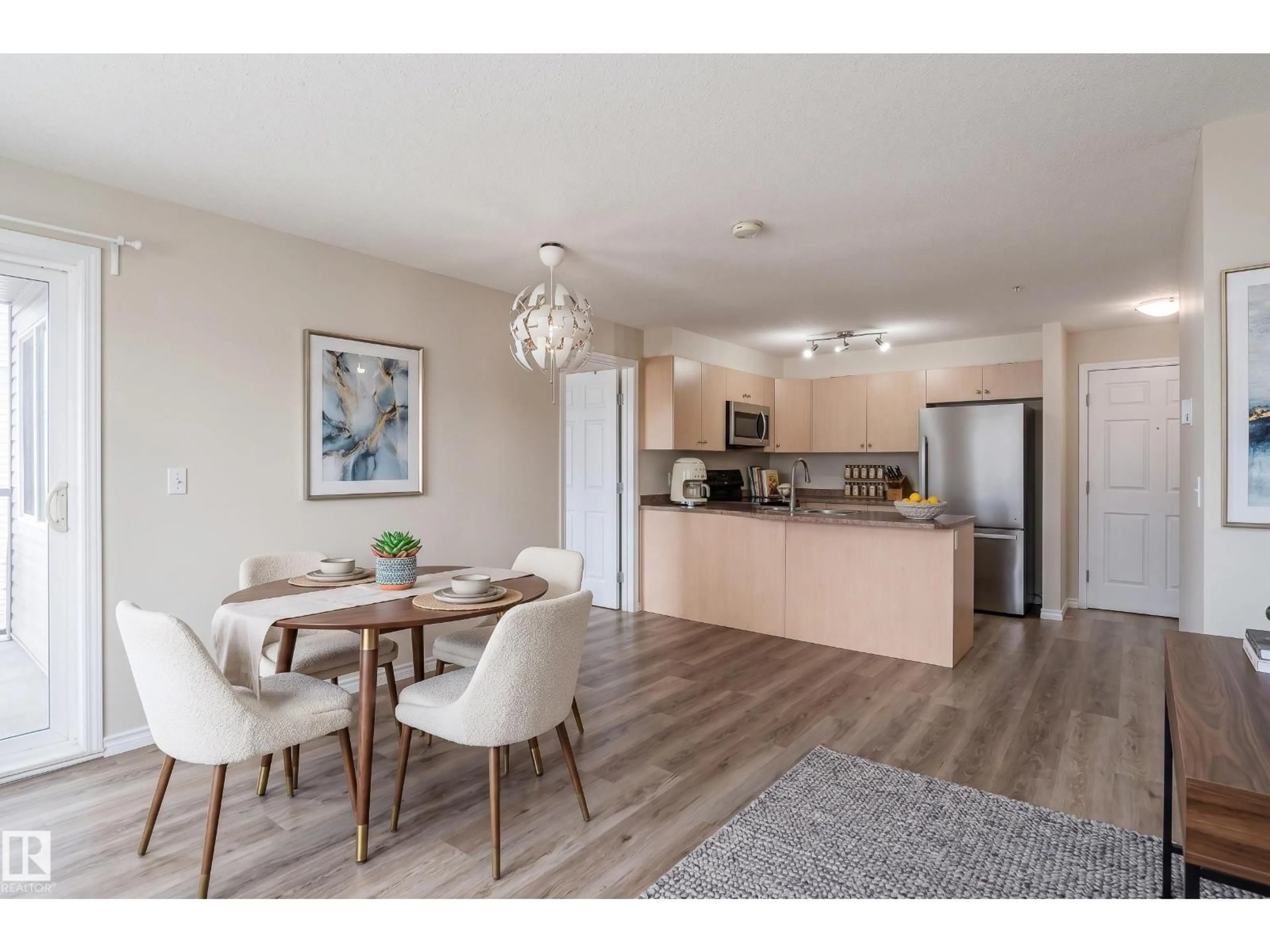 Open concept kitchen, wood/laminate floor for #214 - 4309 33 ST, Stony Plain Alberta T7Z0C4