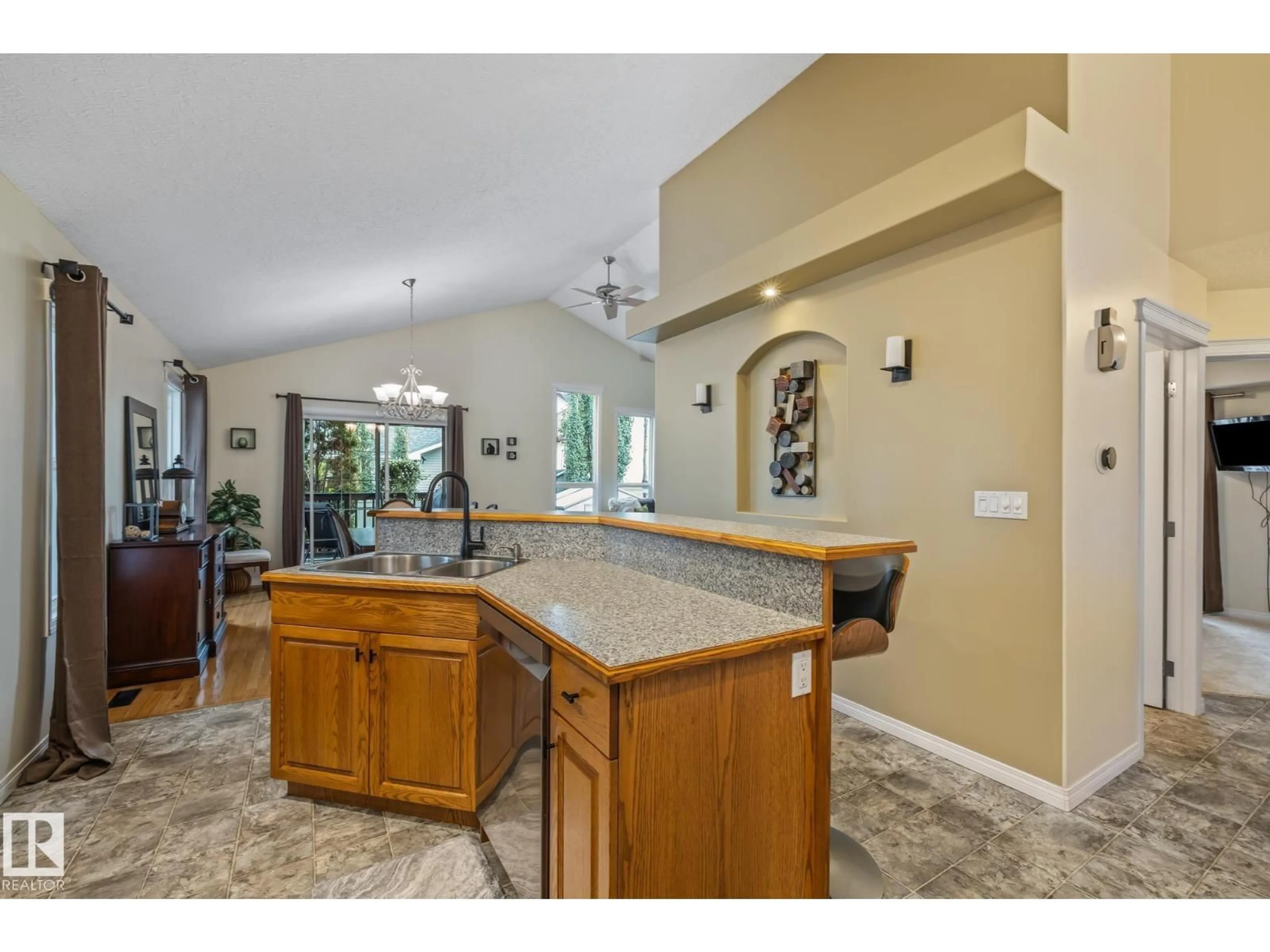 Open concept kitchen, ceramic/tile floor for 10411 95 ST, Morinville Alberta T8R0A2