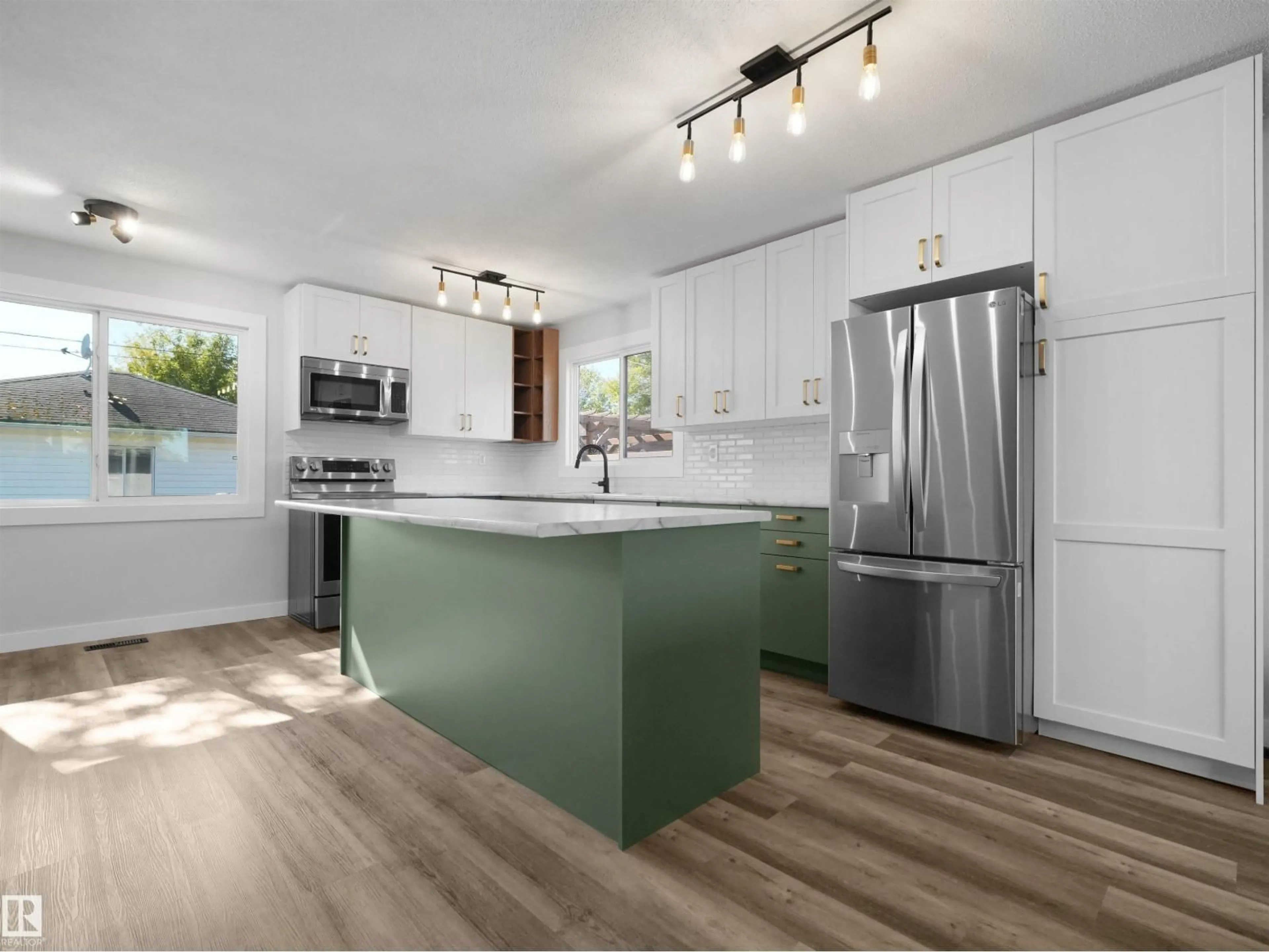 Open concept kitchen, wood/laminate floor for 16 THOMPSON, Devon Alberta T9G1M9