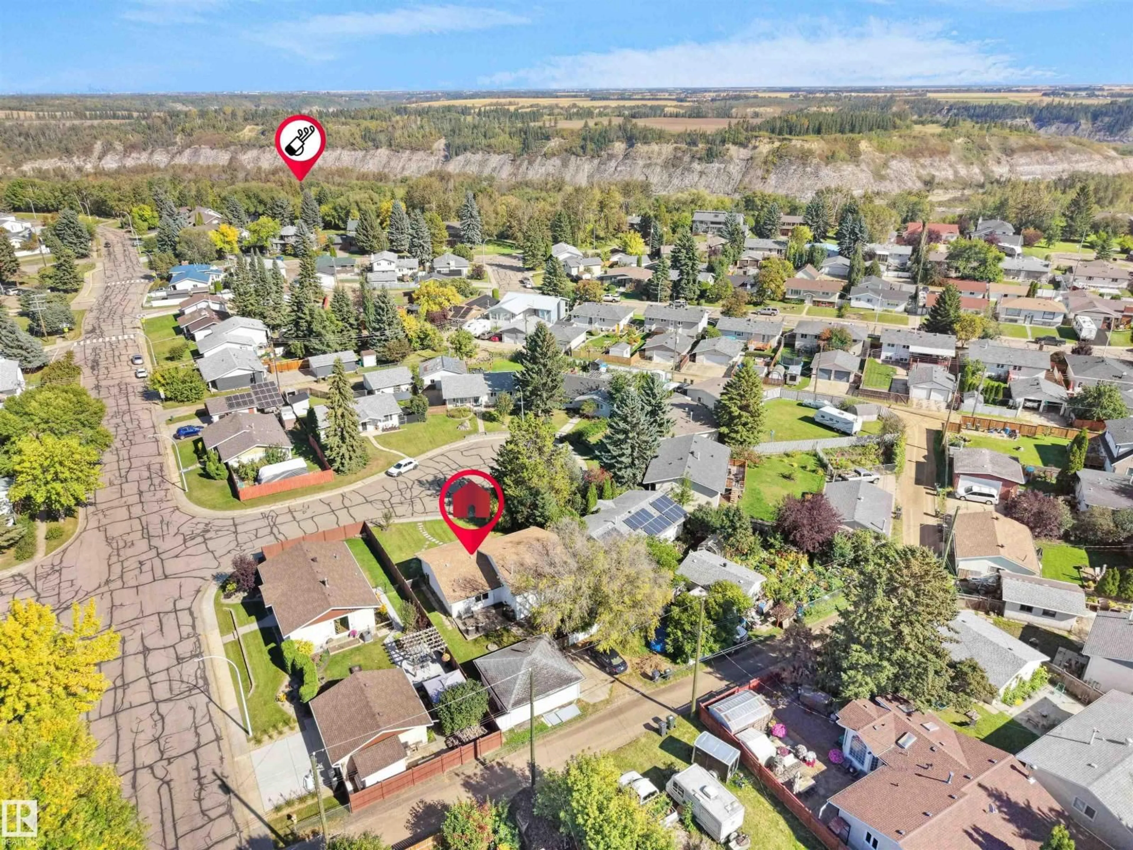 A pic from outside/outdoor area/front of a property/back of a property/a pic from drone, street for 16 THOMPSON, Devon Alberta T9G1M9