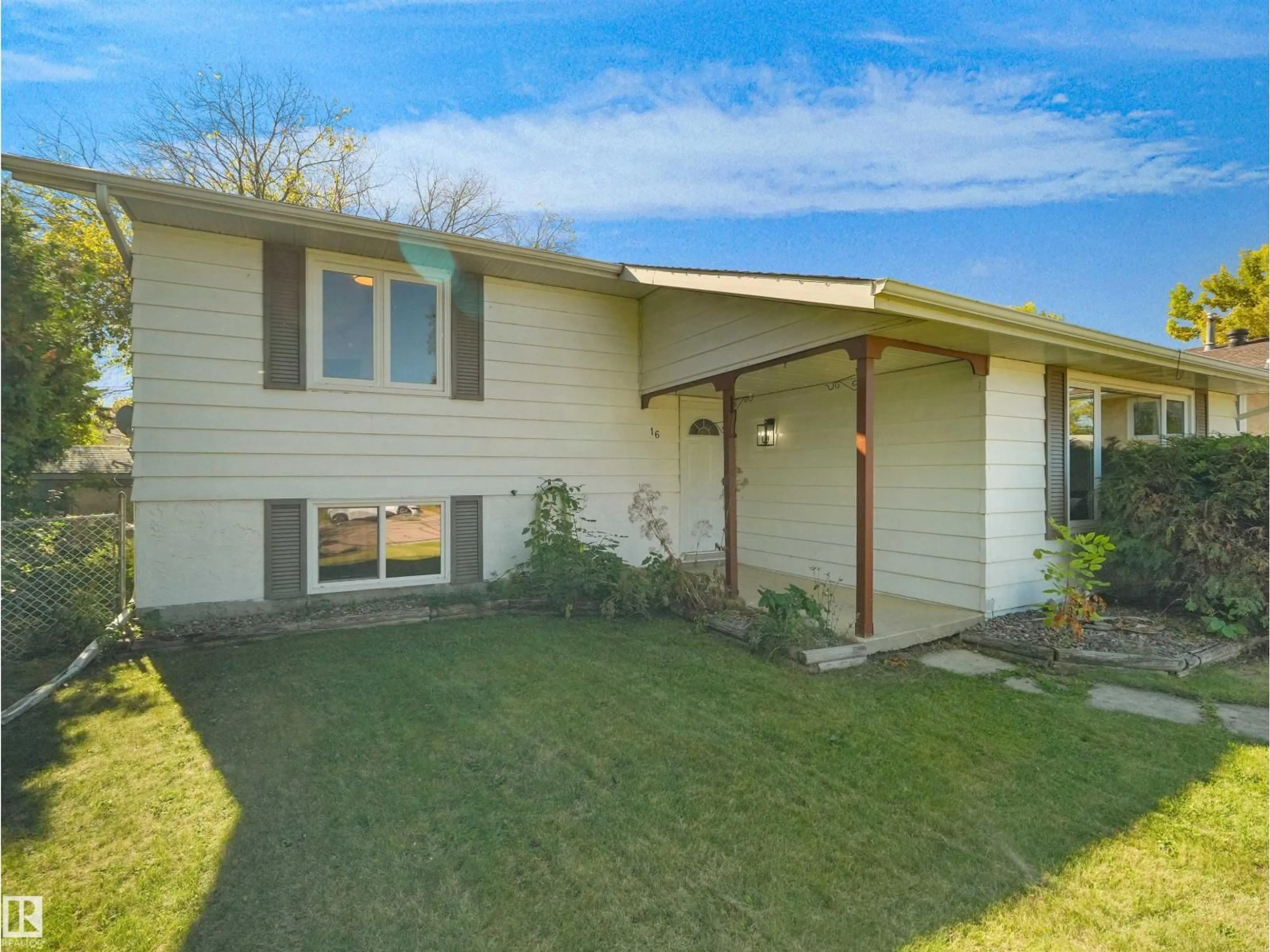Home with vinyl exterior material, street for 16 THOMPSON, Devon Alberta T9G1M9