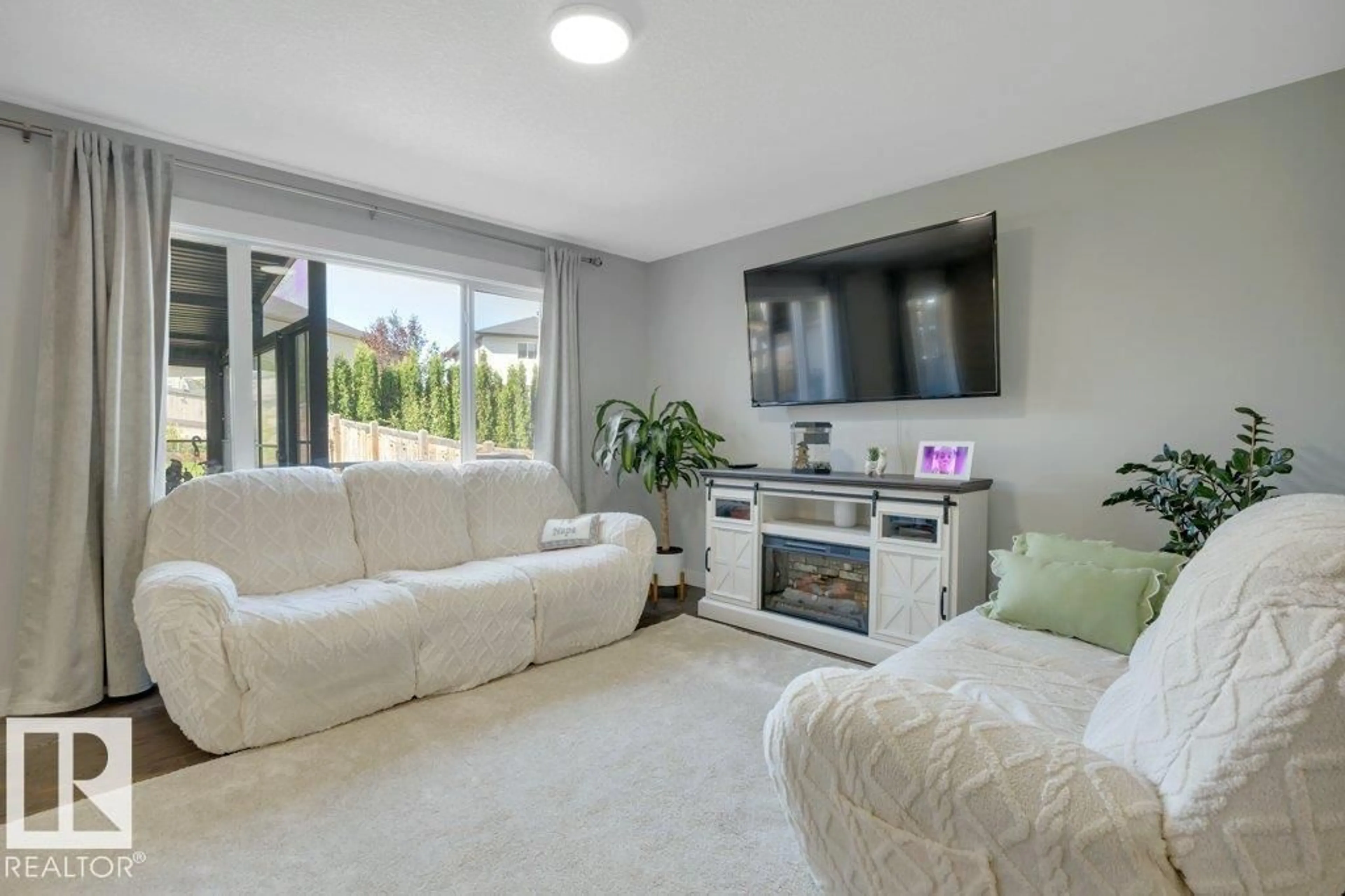 Living room with furniture, unknown for NW - 9732 205 ST, Edmonton Alberta T5T4V7
