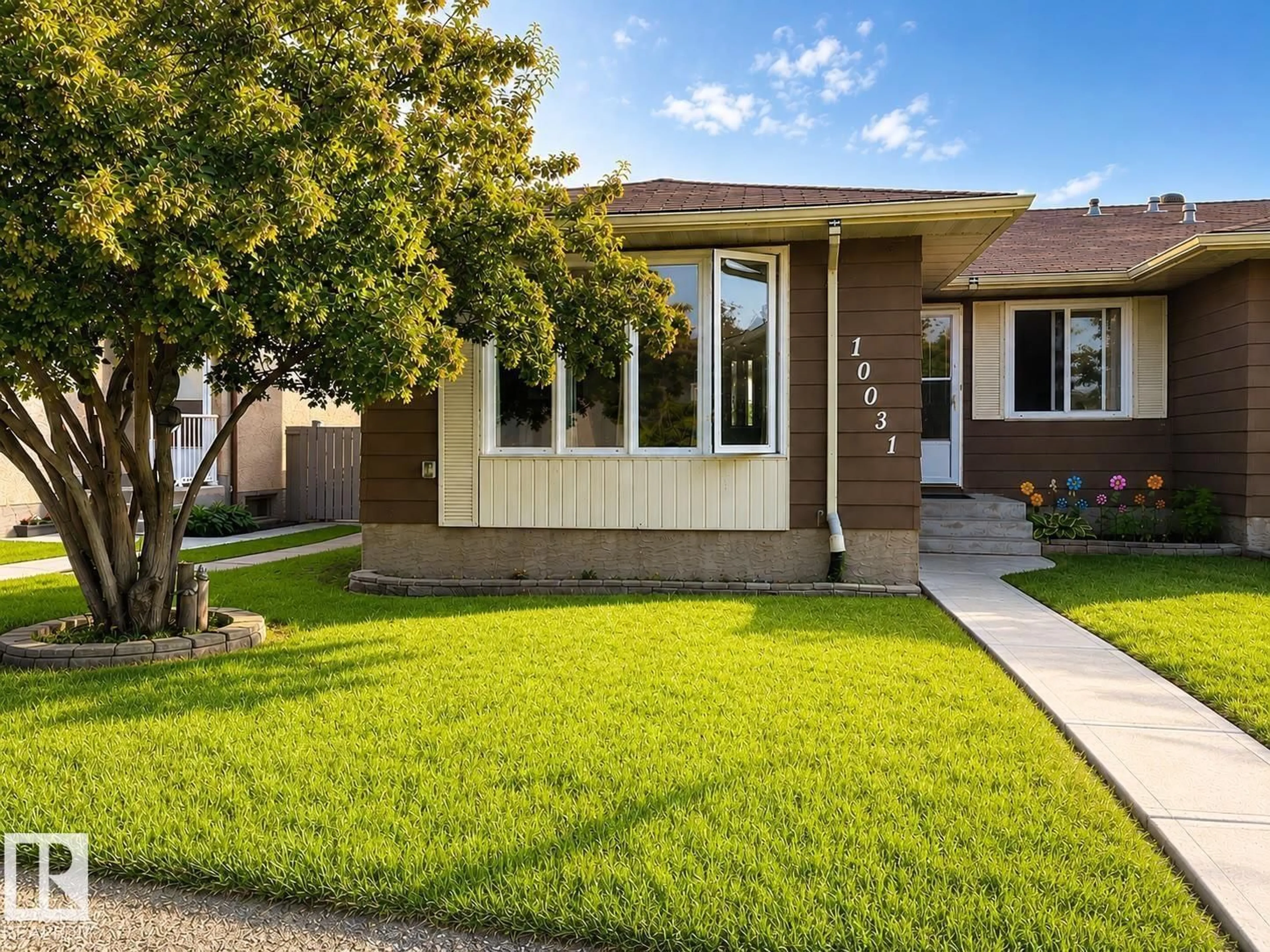 Home with vinyl exterior material, street for 10031 173 AV, Edmonton Alberta T5X3Y1