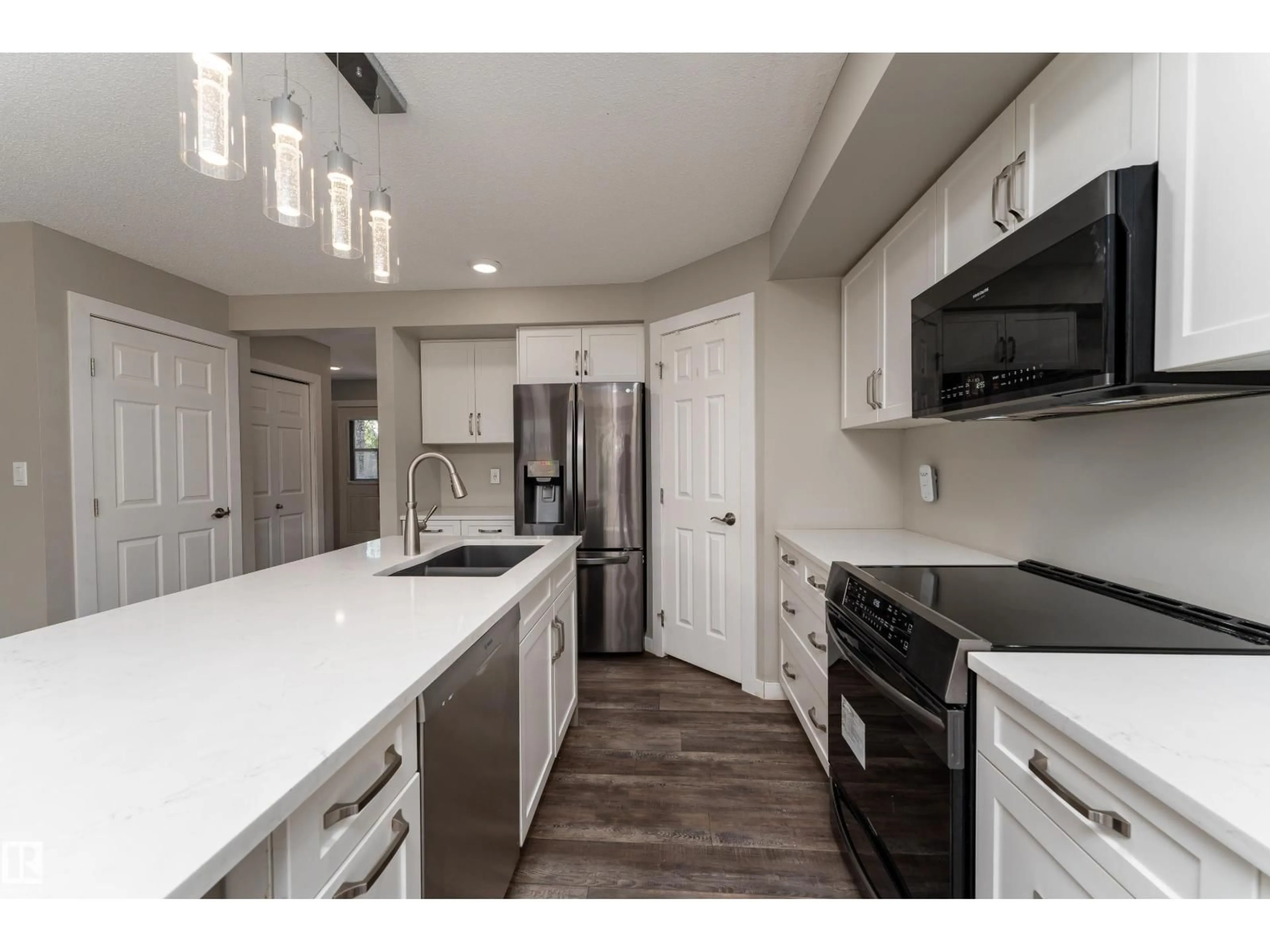 Open concept kitchen, unknown for 101 RUE MONIQUE, Beaumont Alberta T4X0A1