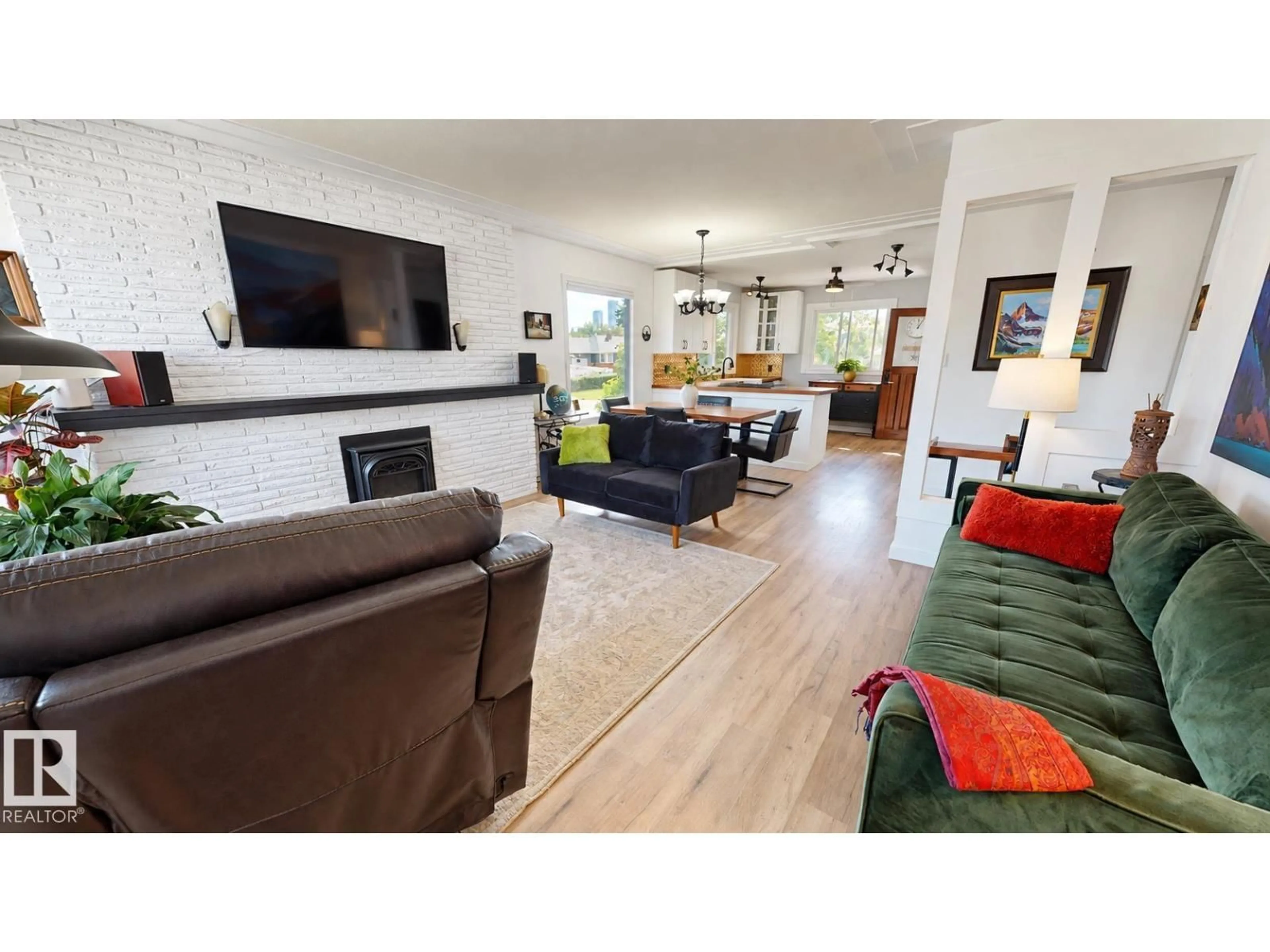Living room with furniture, unknown for 11403 112 AV, Edmonton Alberta T5G0H5