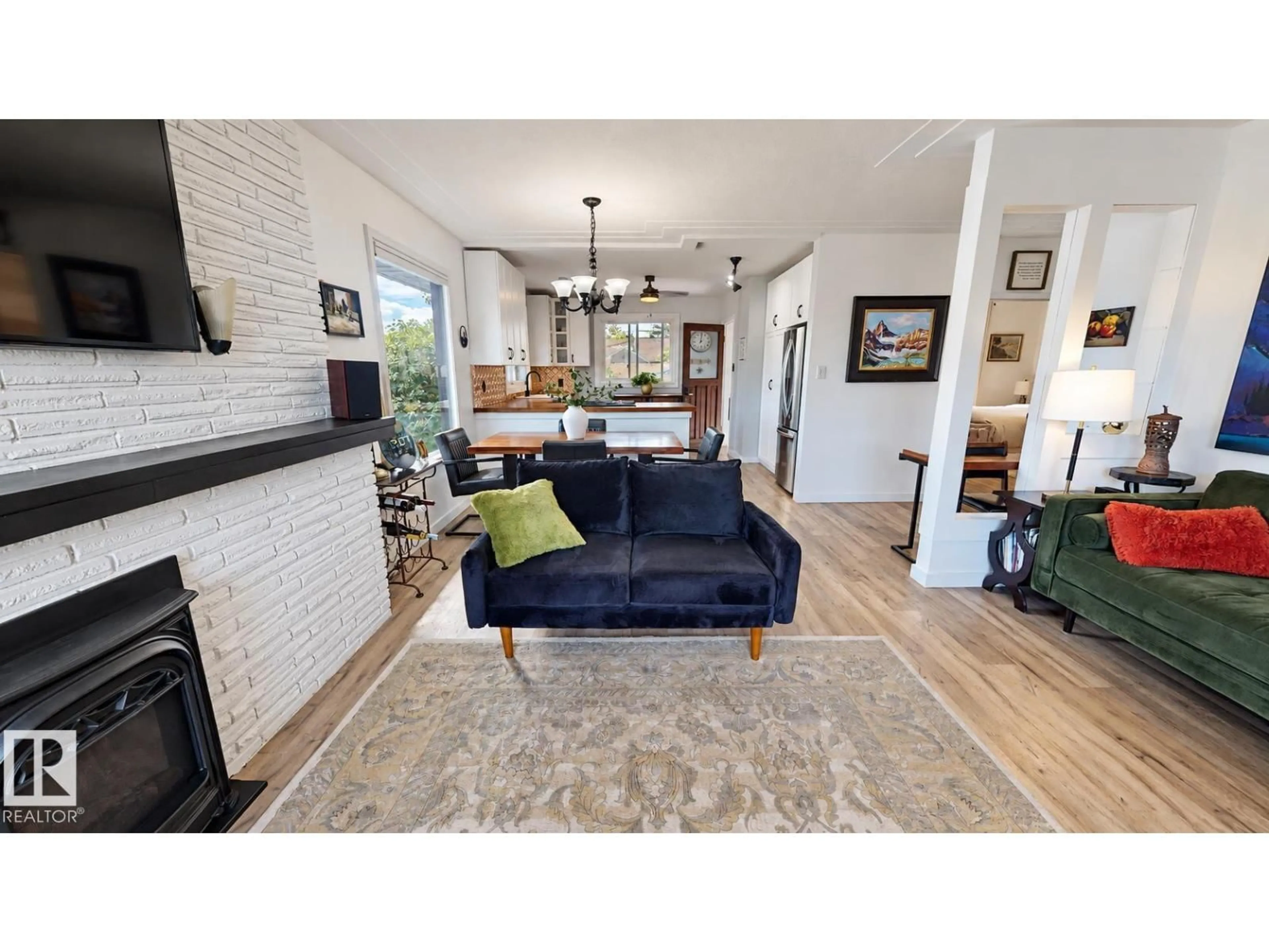Living room with furniture, unknown for 11403 112 AV, Edmonton Alberta T5G0H5