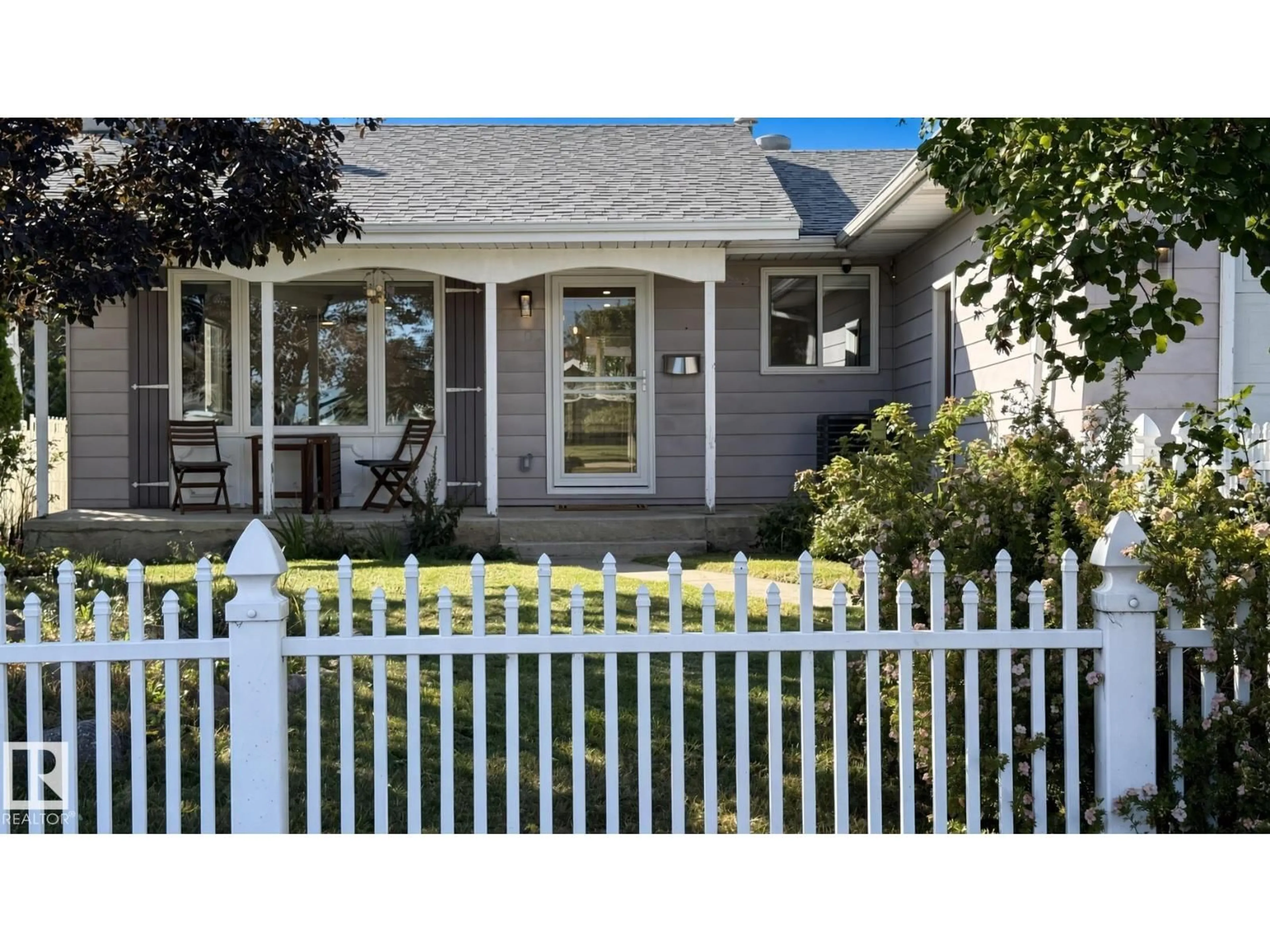Home with vinyl exterior material, street for NW - 3508 106A ST, Edmonton Alberta T6J1A8