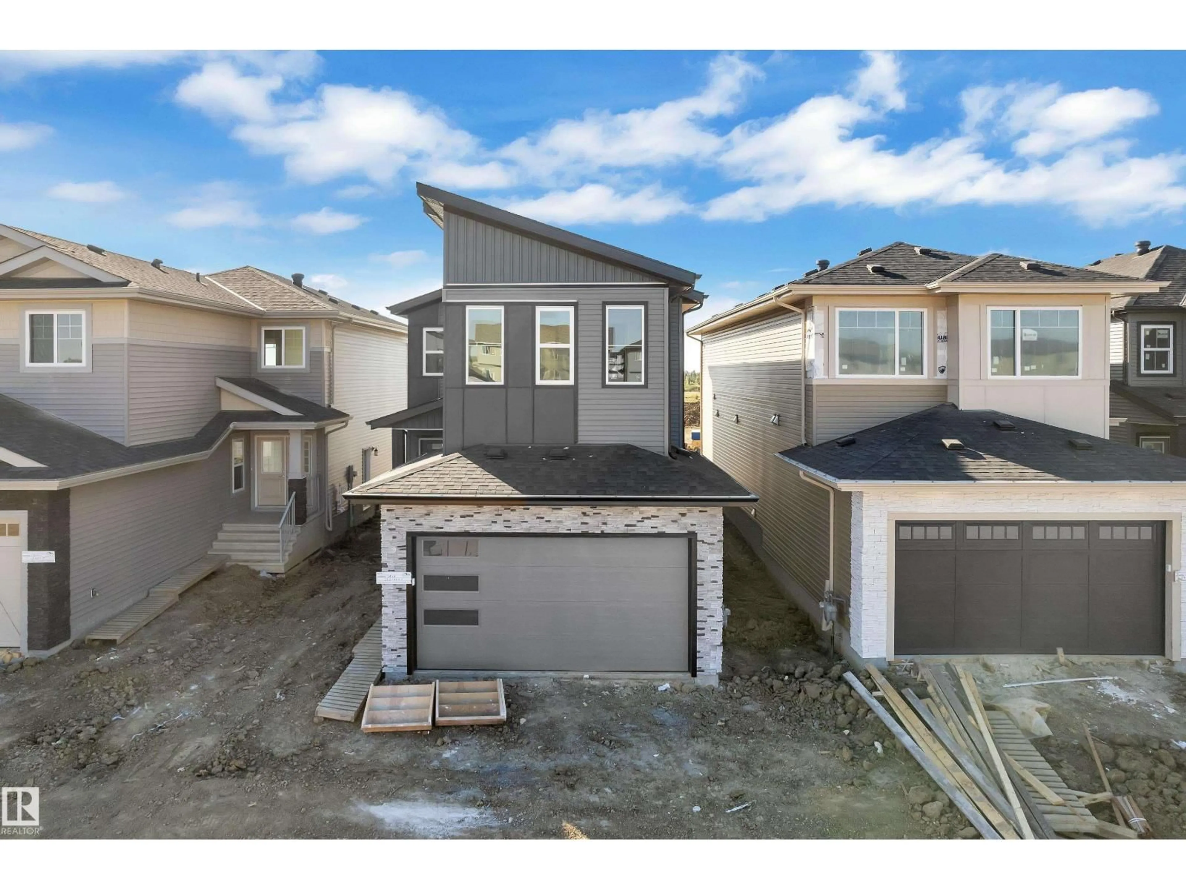 A pic from outside/outdoor area/front of a property/back of a property/a pic from drone, street for 3816 39 ST, Beaumont Alberta T4X3A1