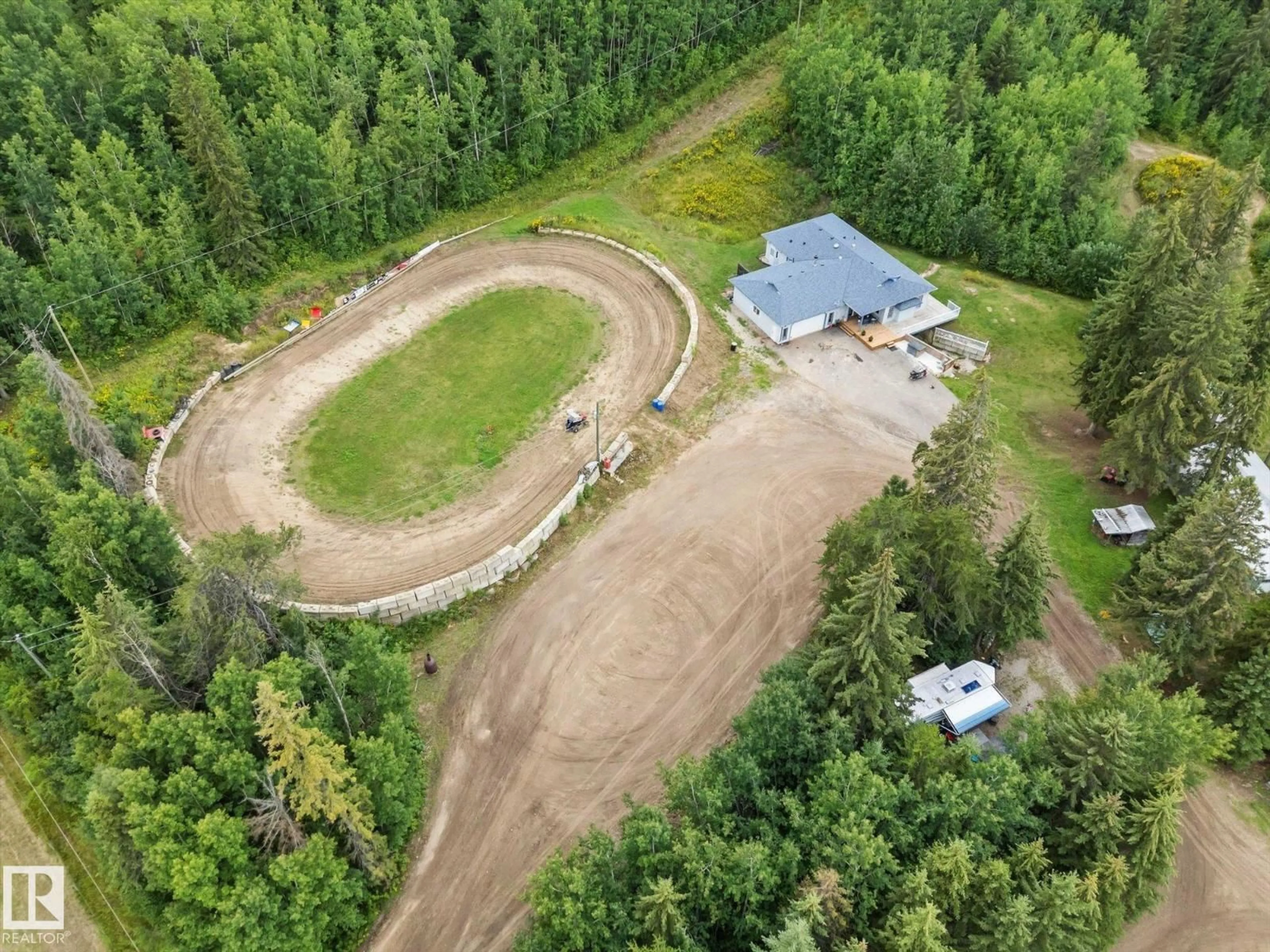 A pic from outside/outdoor area/front of a property/back of a property/a pic from drone, unknown for 54426 RGE ROAD 15, Rural Lac Ste. Anne County Alberta T0E1V0