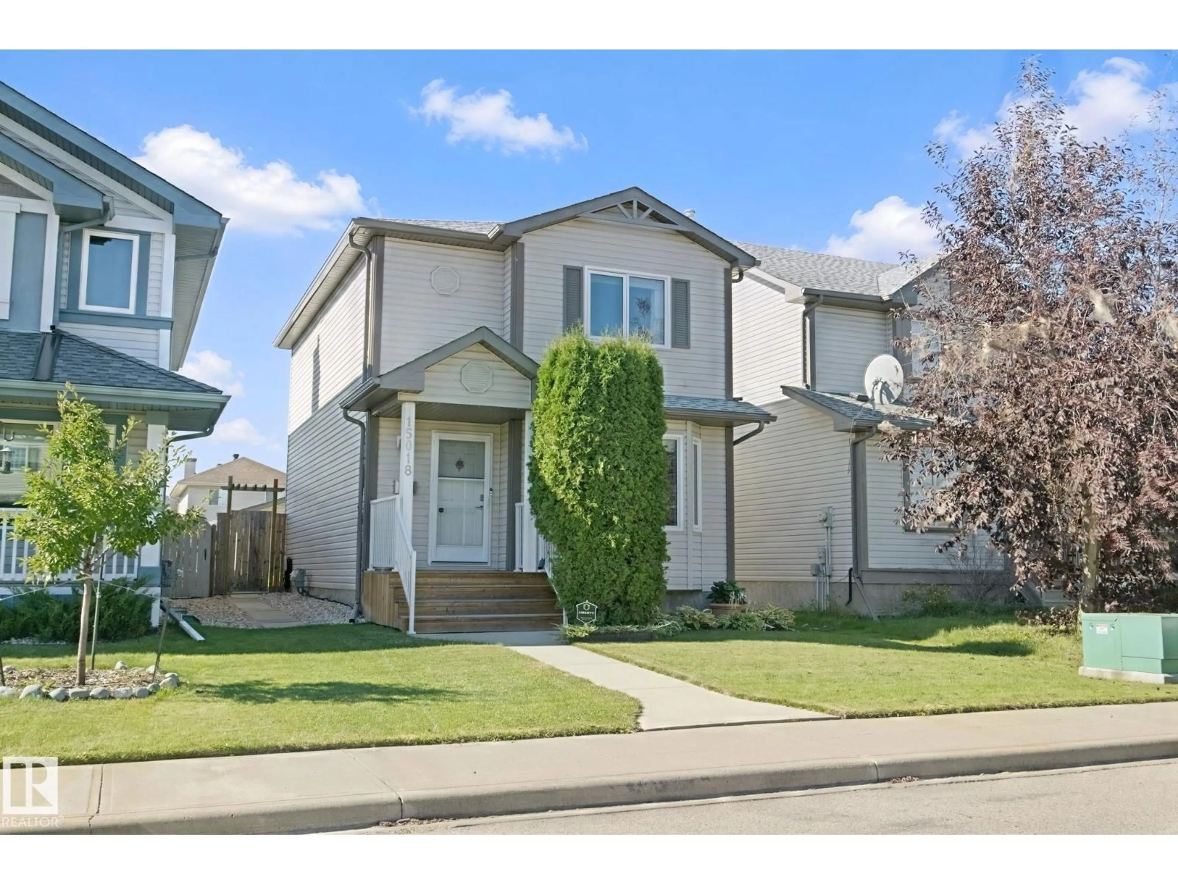 Home with vinyl exterior material, street for NW - 15018 135A ST, Edmonton Alberta T6V1N1