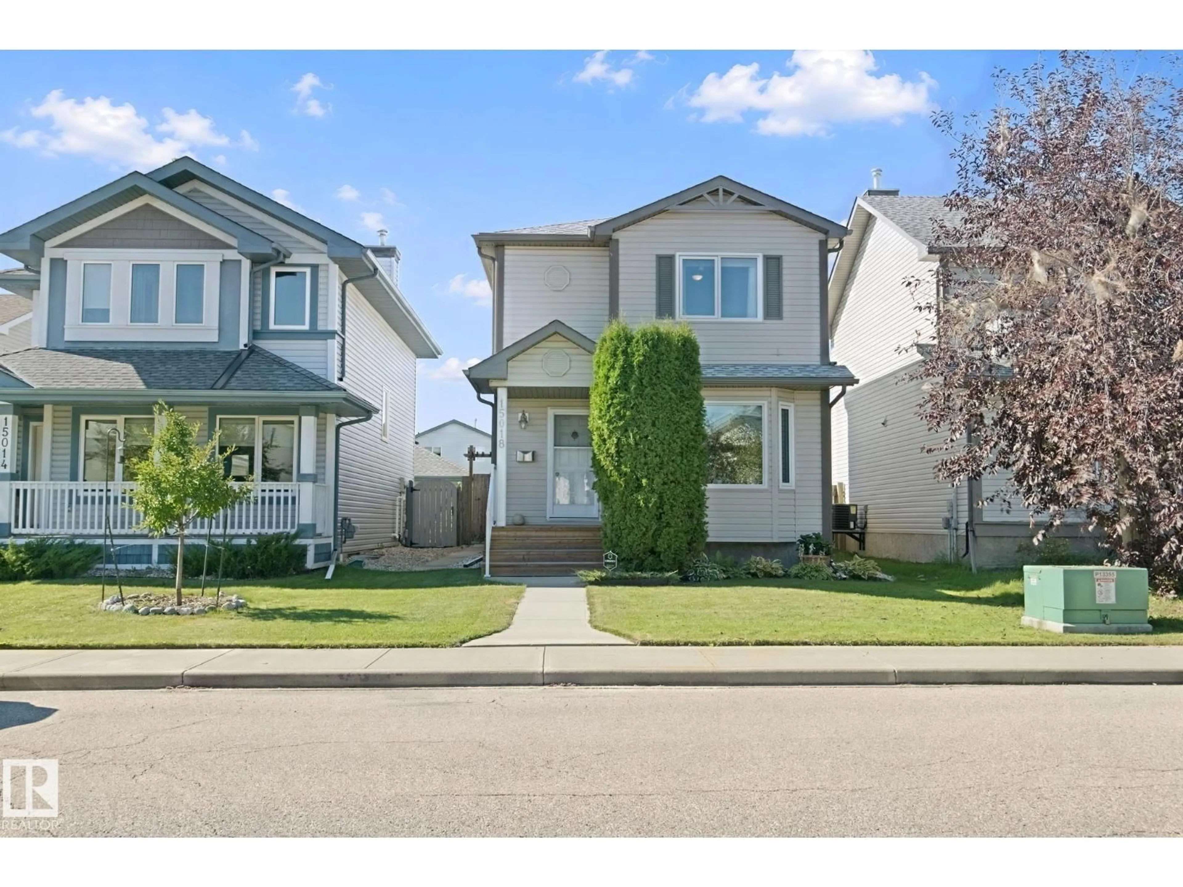 Home with vinyl exterior material, street for NW - 15018 135A ST, Edmonton Alberta T6V1N1