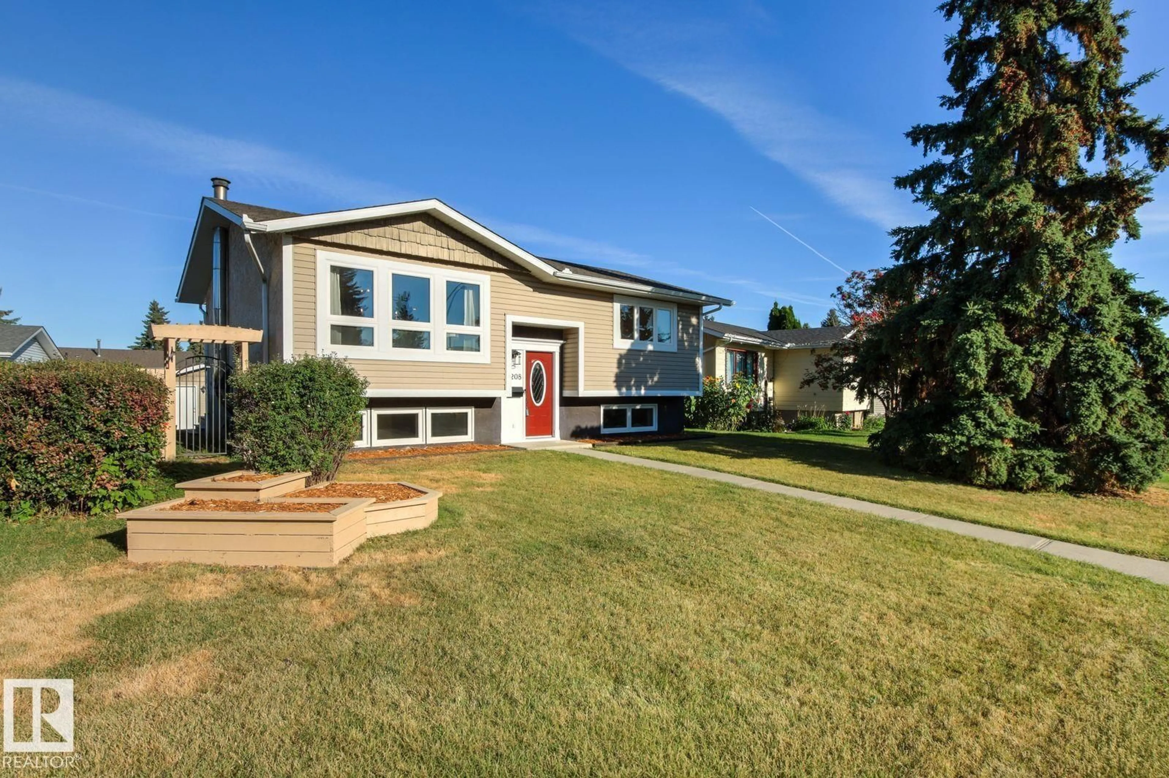 Home with vinyl exterior material, street for 5208 10 AV, Edmonton Alberta T6L1Z1