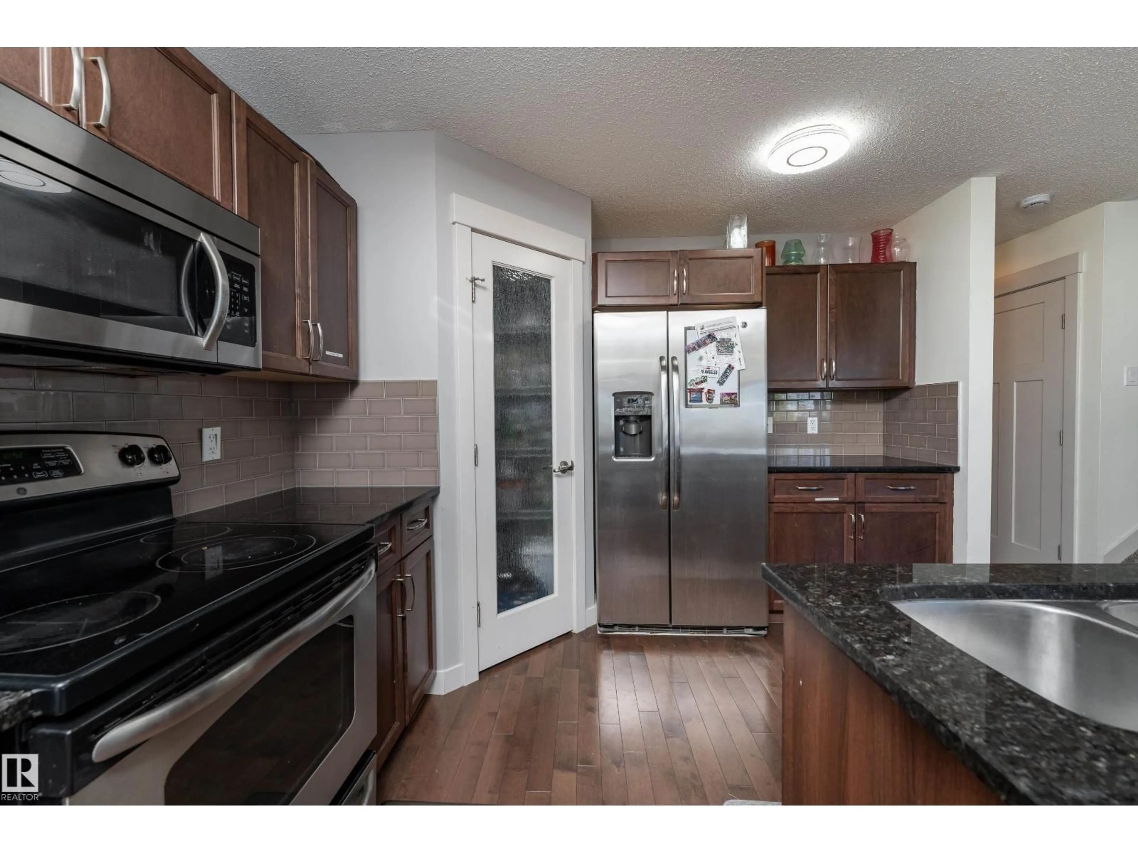 Standard kitchen, wood/laminate floor for 448 REED CR, Leduc Alberta T9E0R5