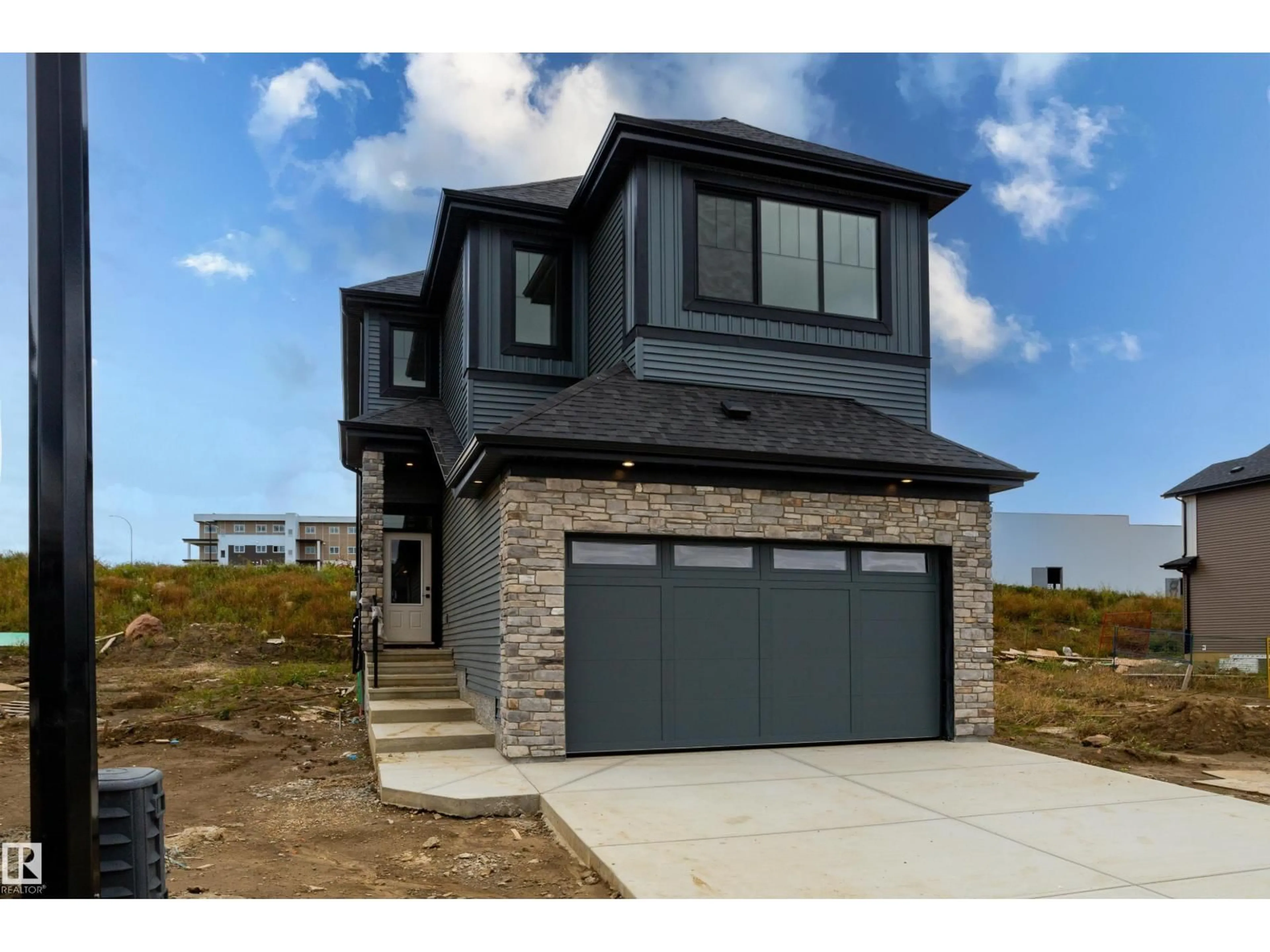 Home with brick exterior material, street for NW - 1429 OSPREY CO, Edmonton Alberta T5S0H3