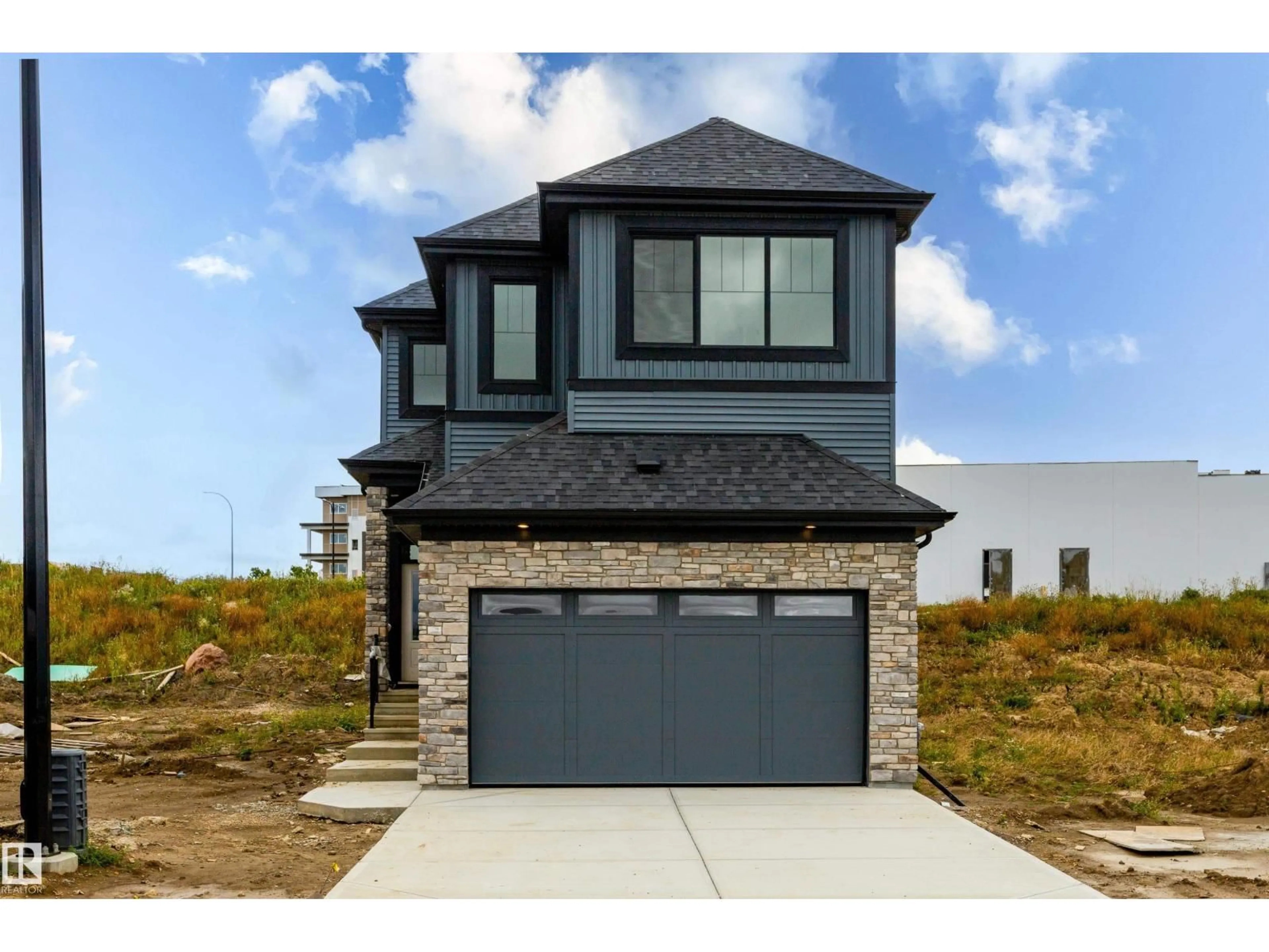 Home with brick exterior material, street for NW - 1429 OSPREY CO, Edmonton Alberta T5S0H3