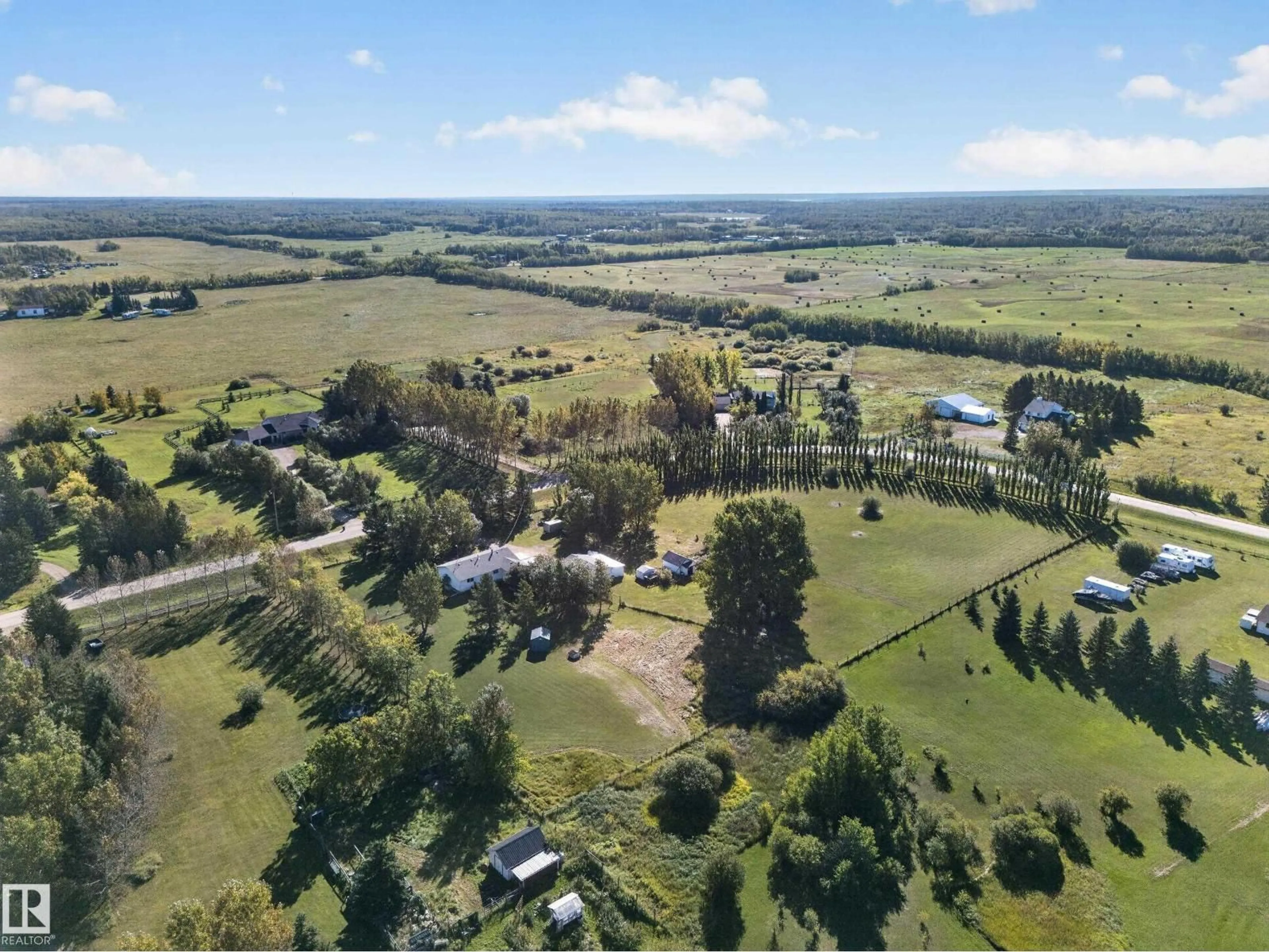 A pic from outside/outdoor area/front of a property/back of a property/a pic from drone, mountain view for 52249 - 158 RGE ROAD 222, Rural Strathcona County Alberta T8C1J2