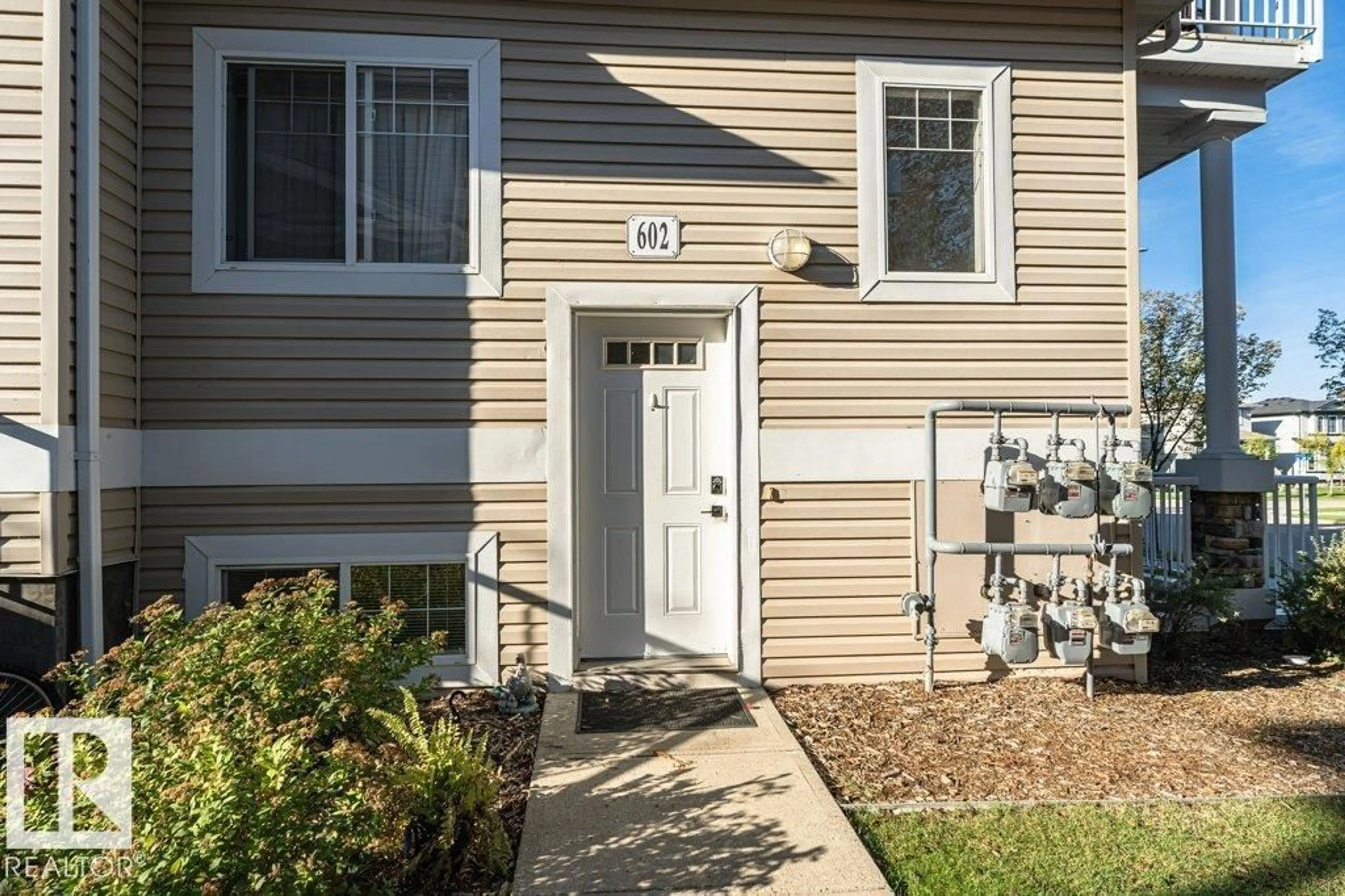 Home with vinyl exterior material, street for 164 - 602 BRIDGEPORT BV, Leduc Alberta T9E0L3