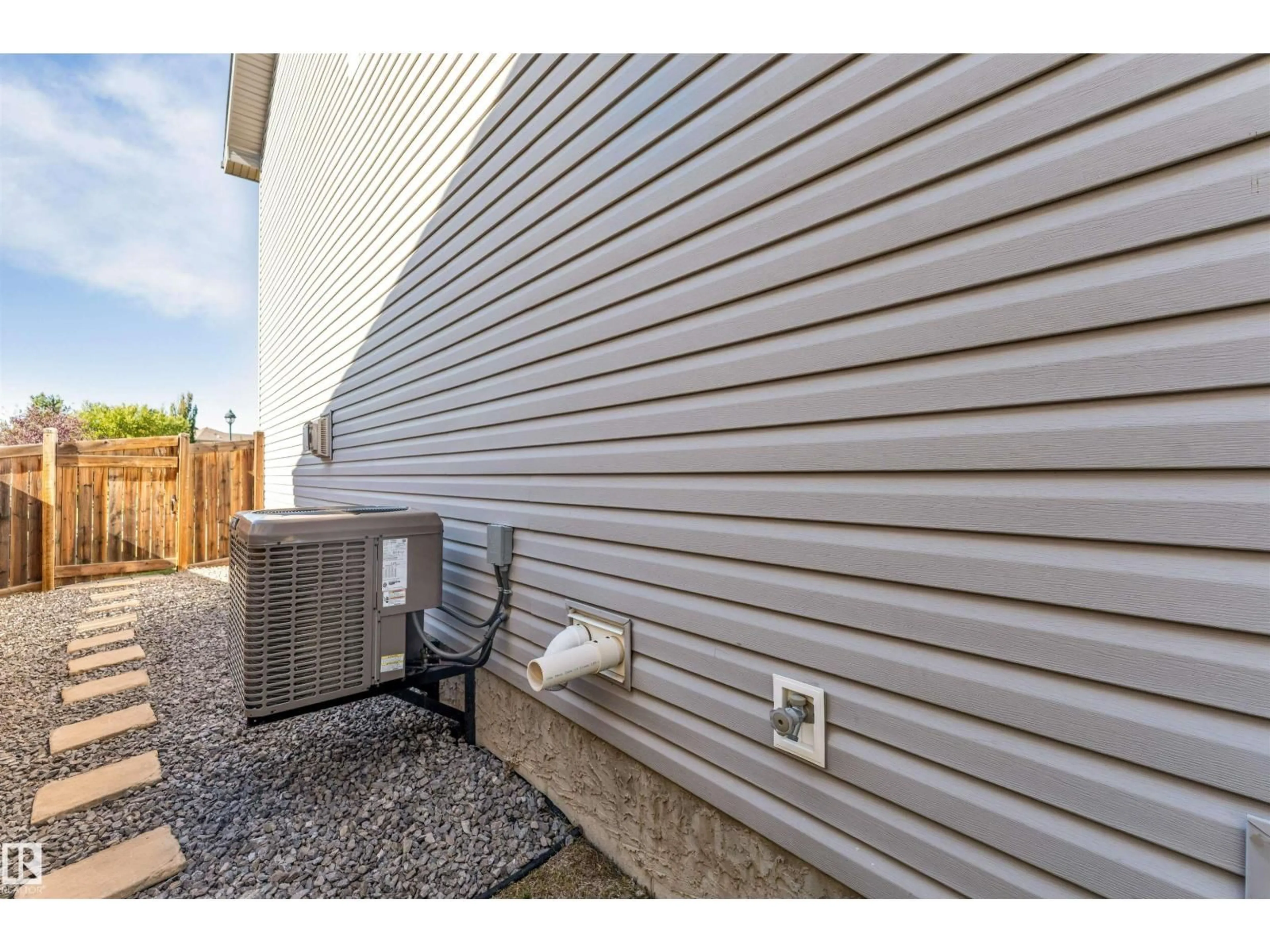 Home with vinyl exterior material, street for 3662 13 ST NW, Edmonton Alberta T5T0J5