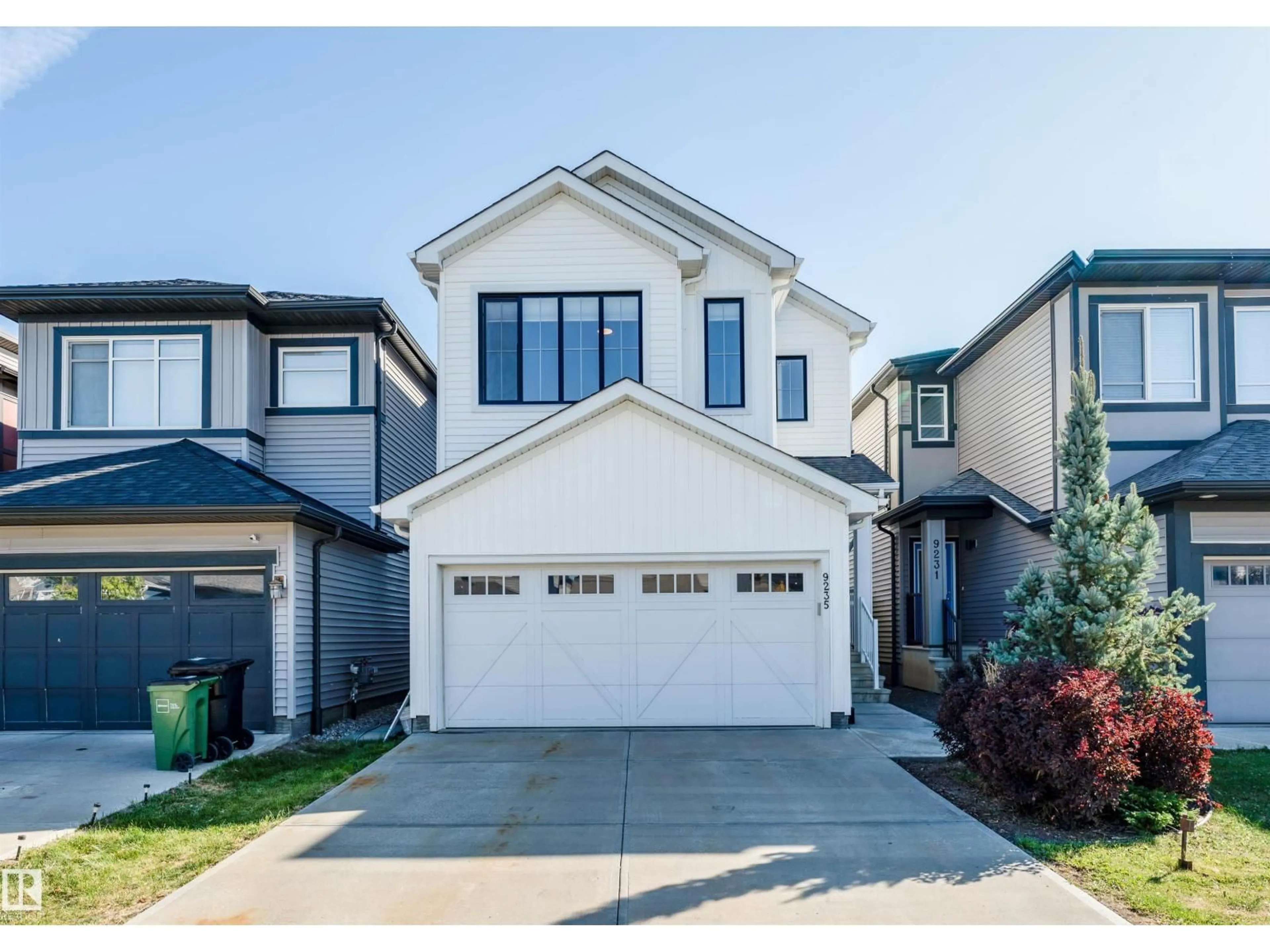 Home with vinyl exterior material, street for NW - 9235 223 ST, Edmonton Alberta T5T7M1