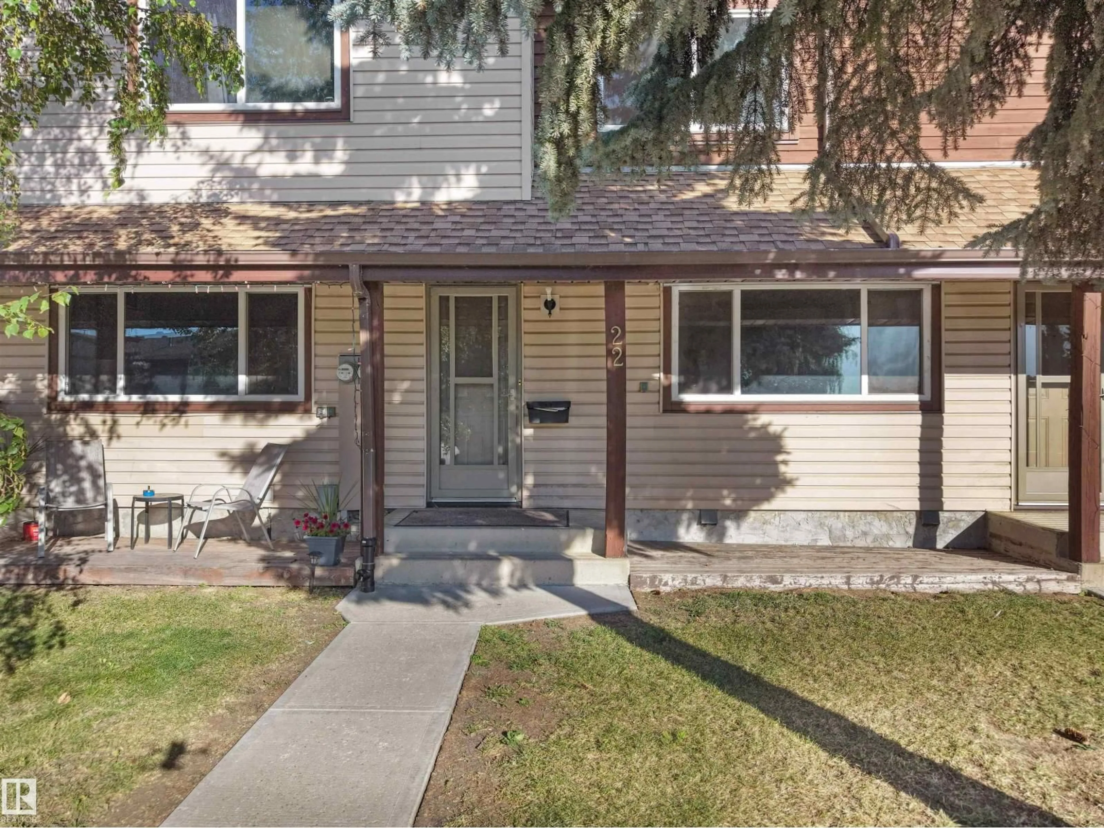 Home with vinyl exterior material, street for #22 - 13833 30 ST, Edmonton Alberta T5Y2B2