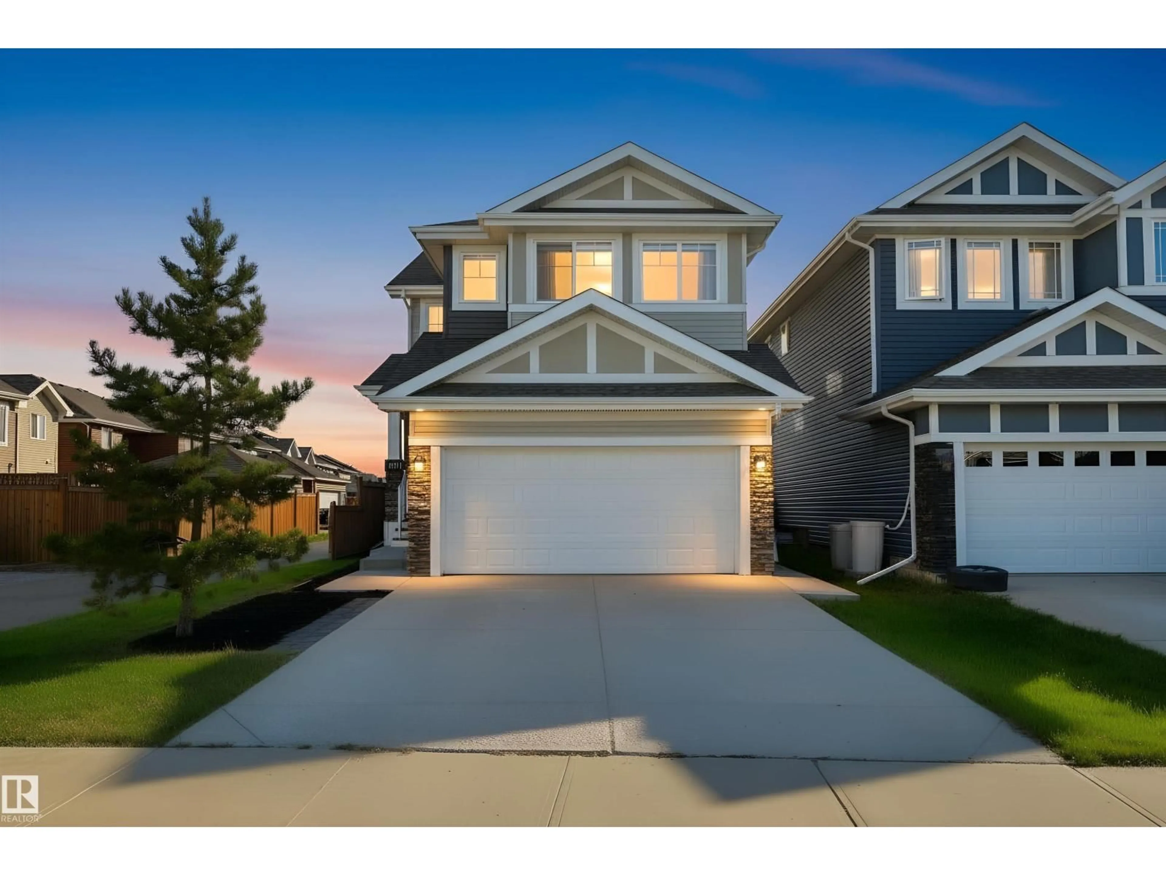 Home with vinyl exterior material, street for SW - 1419 169 ST, Edmonton Alberta T6W3P7