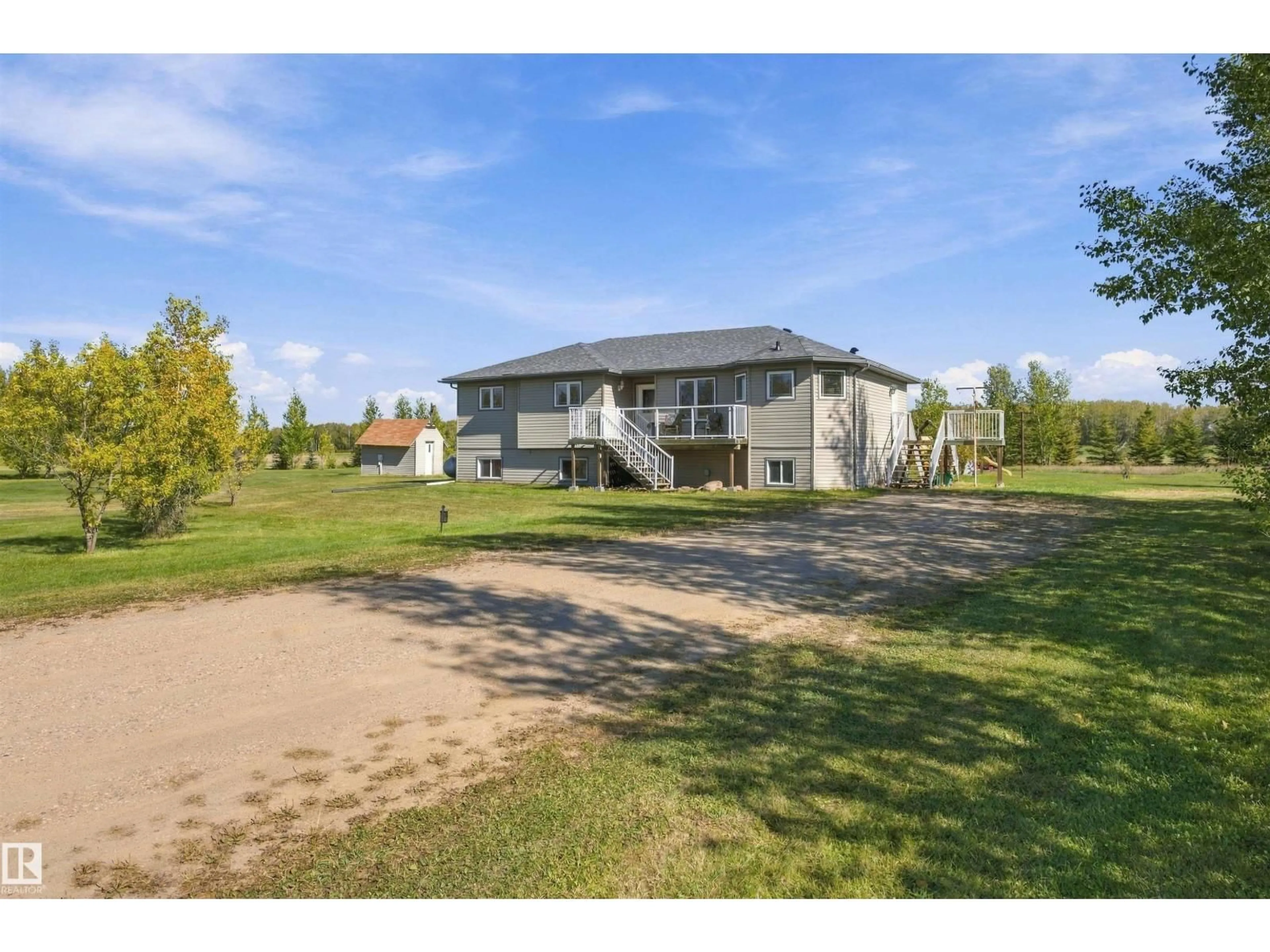 A pic from outside/outdoor area/front of a property/back of a property/a pic from drone, building for 654043 RGE ROAD 222, Rural Athabasca County Alberta T9S2B4