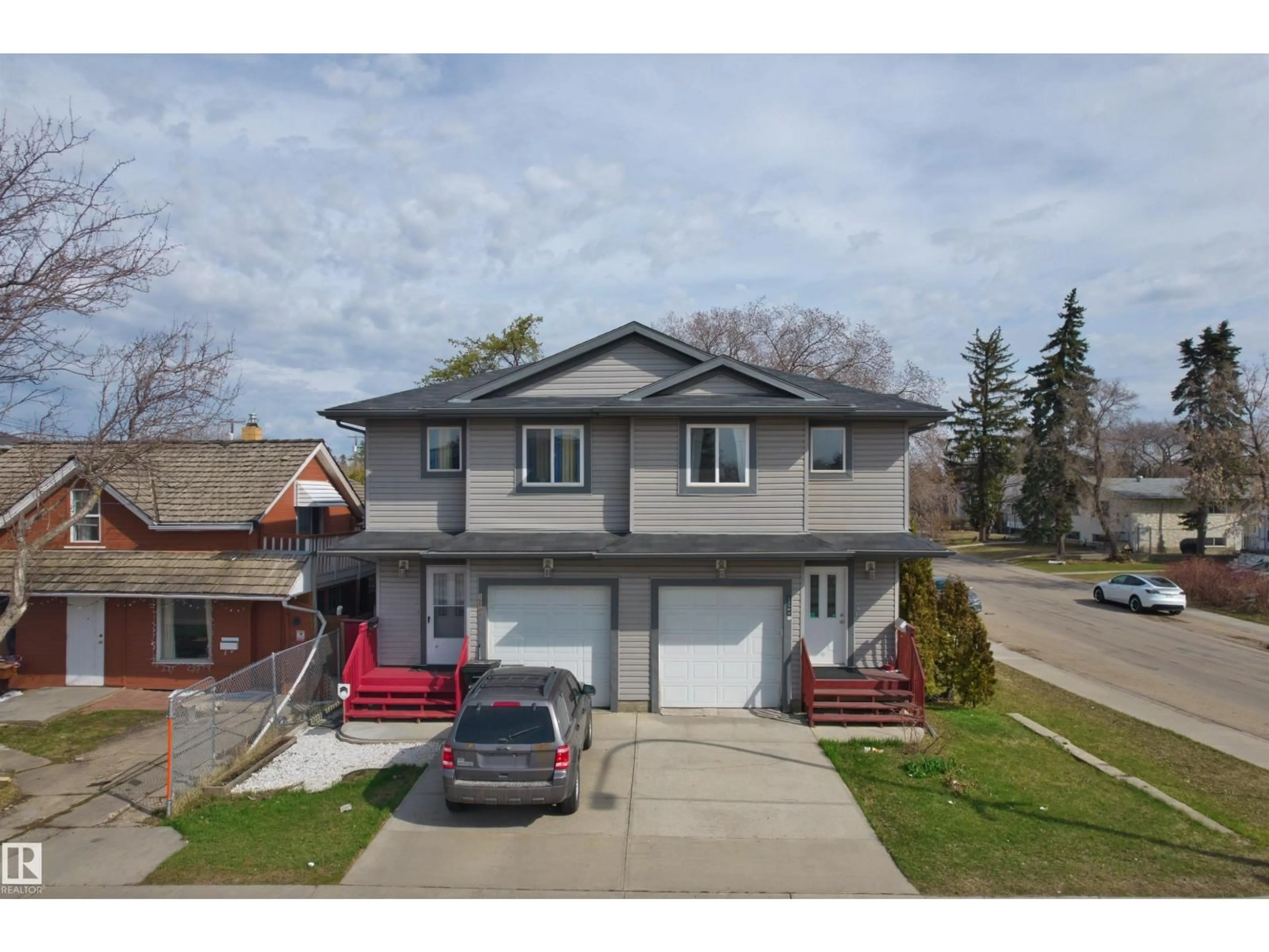 A pic from outside/outdoor area/front of a property/back of a property/a pic from drone, street for 15504 102 AV, Edmonton Alberta T5P0N2