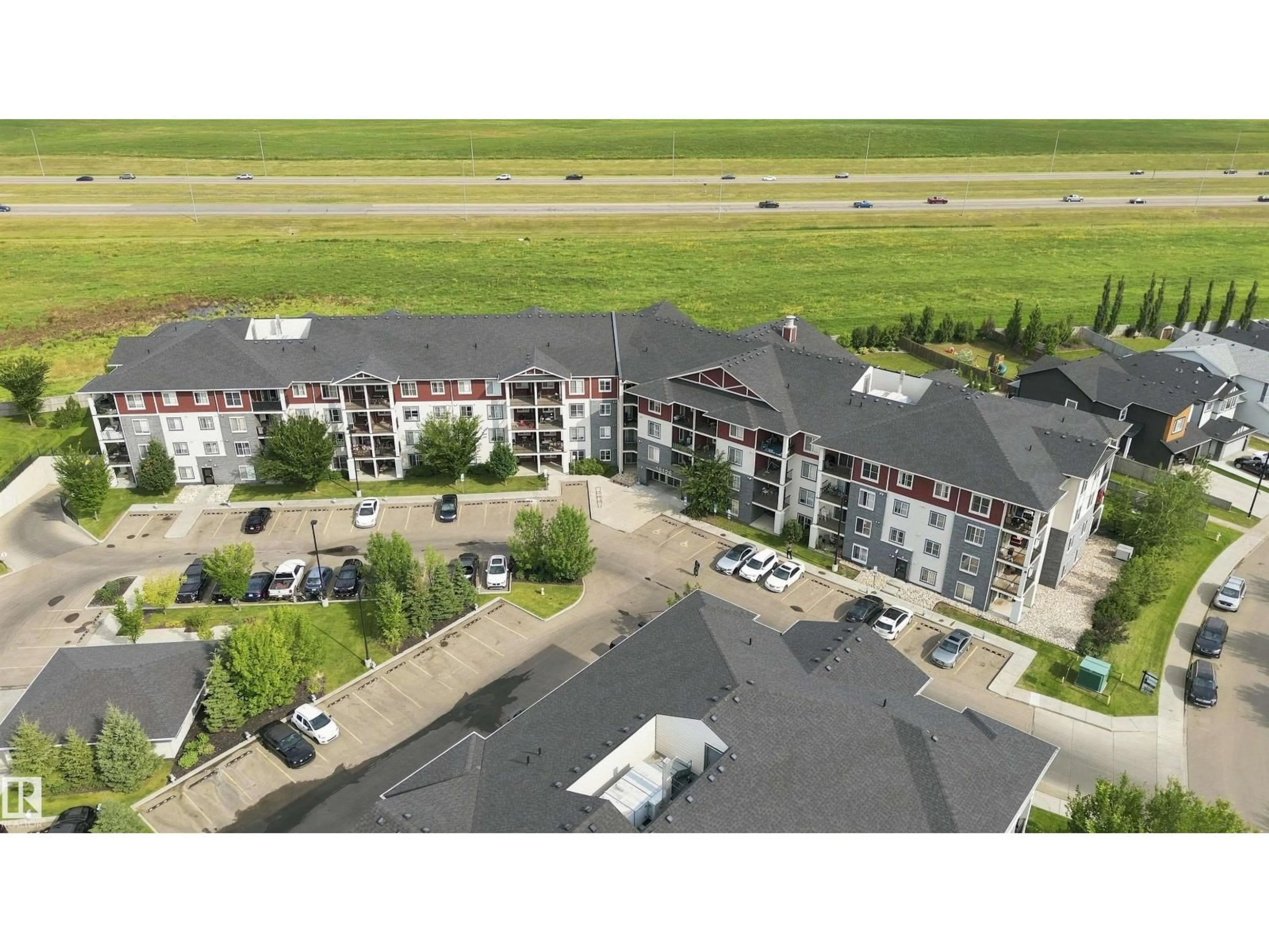 A pic from outside/outdoor area/front of a property/back of a property/a pic from drone, building for #413 - 18126 77 ST, Edmonton Alberta T5Z0N7