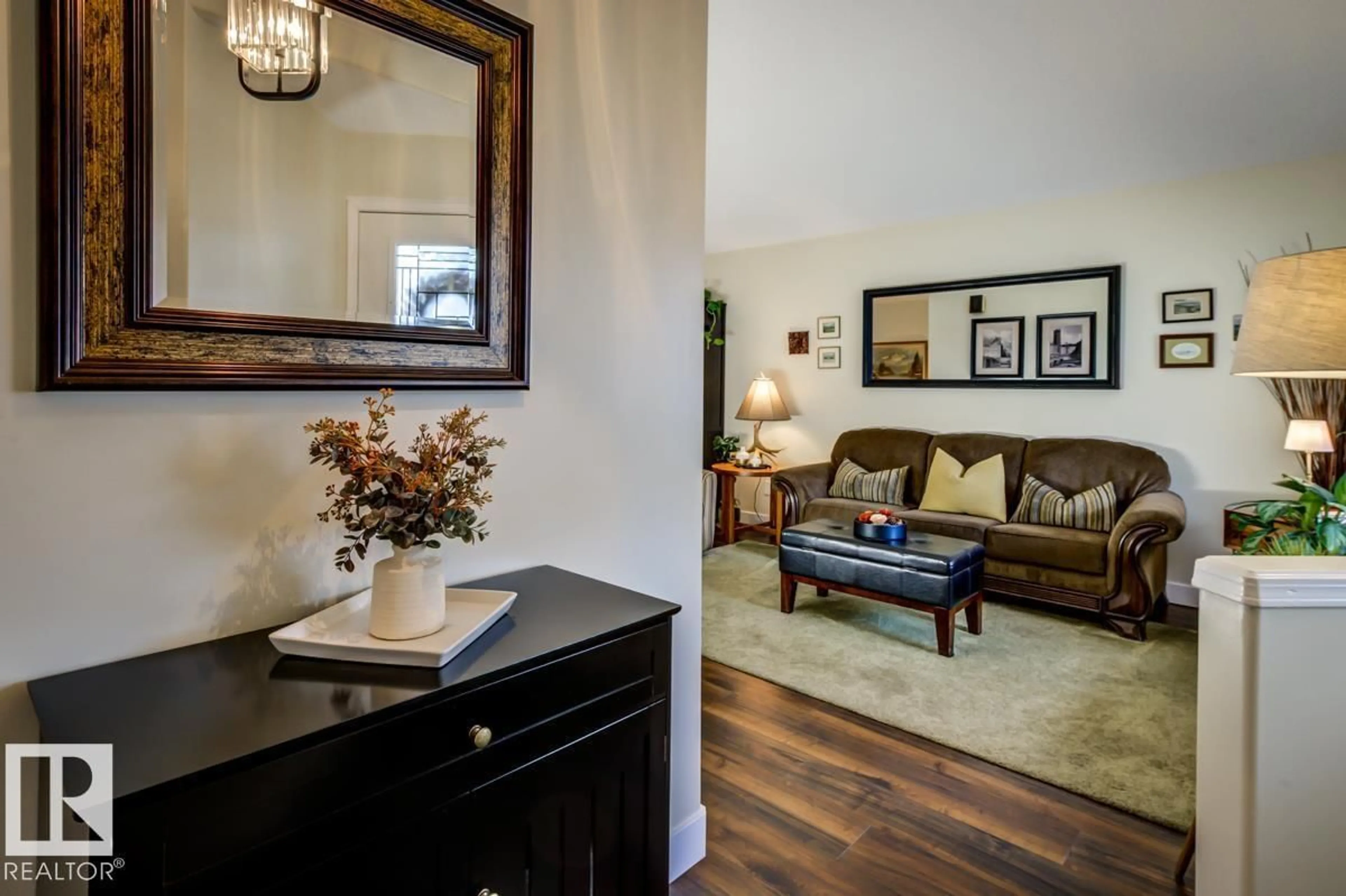 Living room with furniture, wood/laminate floor for 3 RUE BRUNELLE, Beaumont Alberta T4X1P5