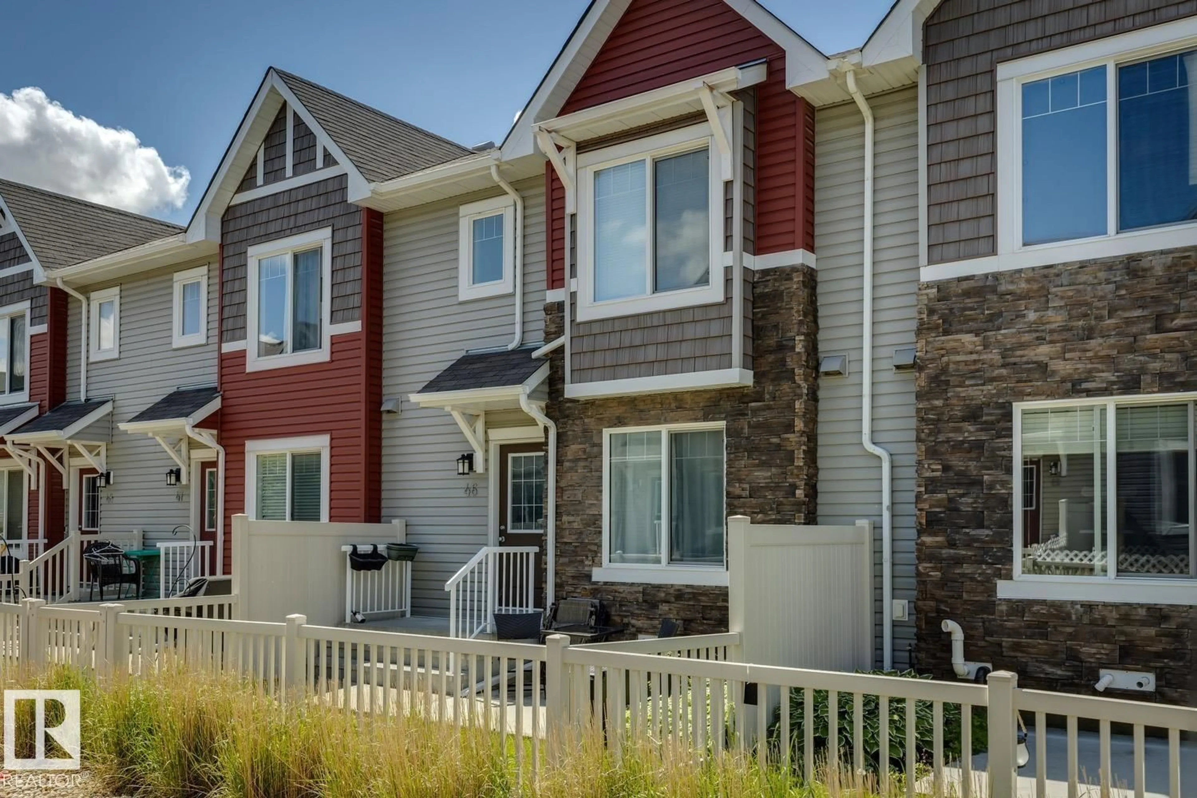 Home with vinyl exterior material, street for 46 - 5317 3 AV SW, Edmonton Alberta T6X0W7