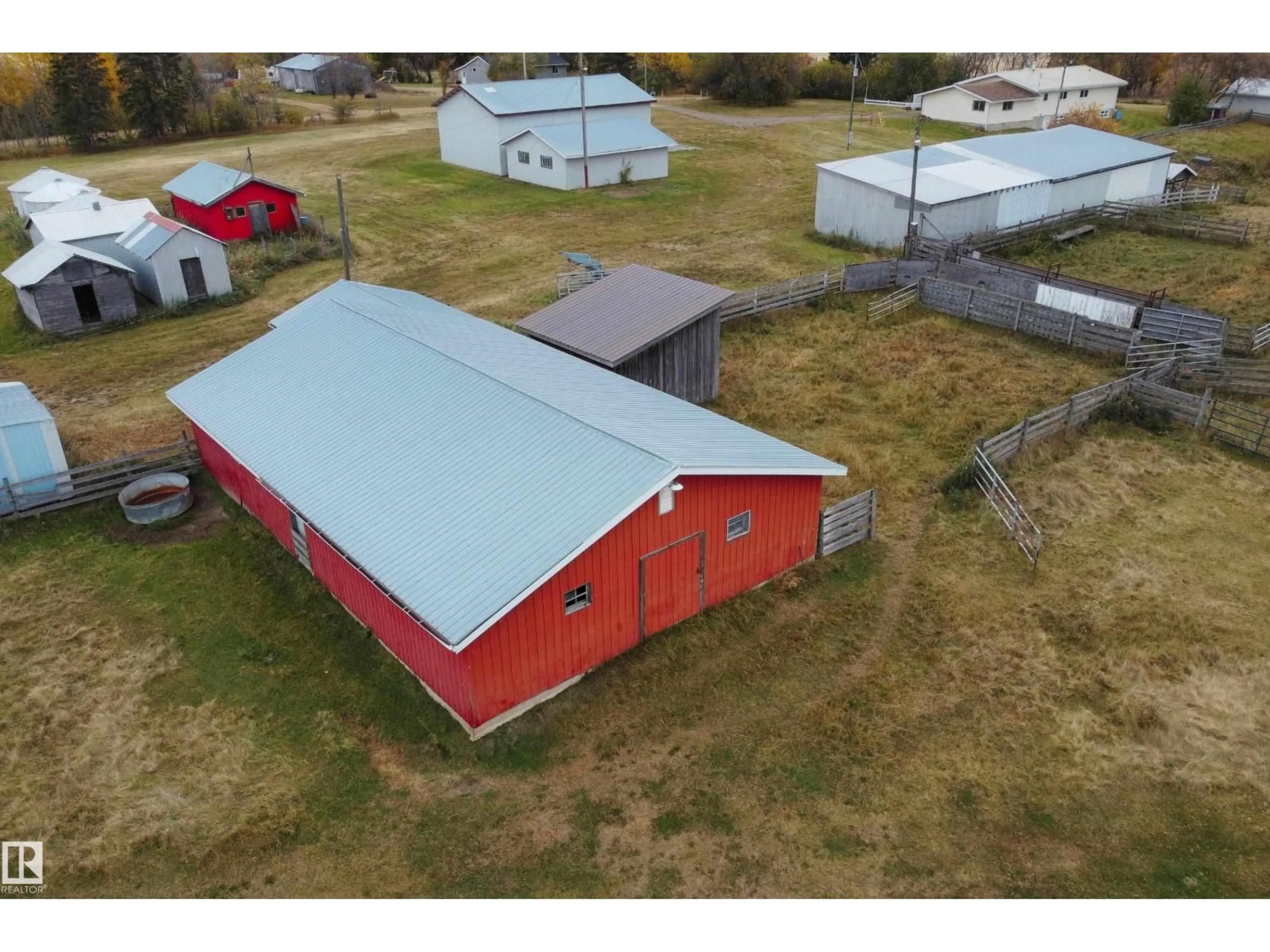 A pic from outside/outdoor area/front of a property/back of a property/a pic from drone, building for 61302 RGE RD 50, Rural Barrhead County Alberta T7N1N2