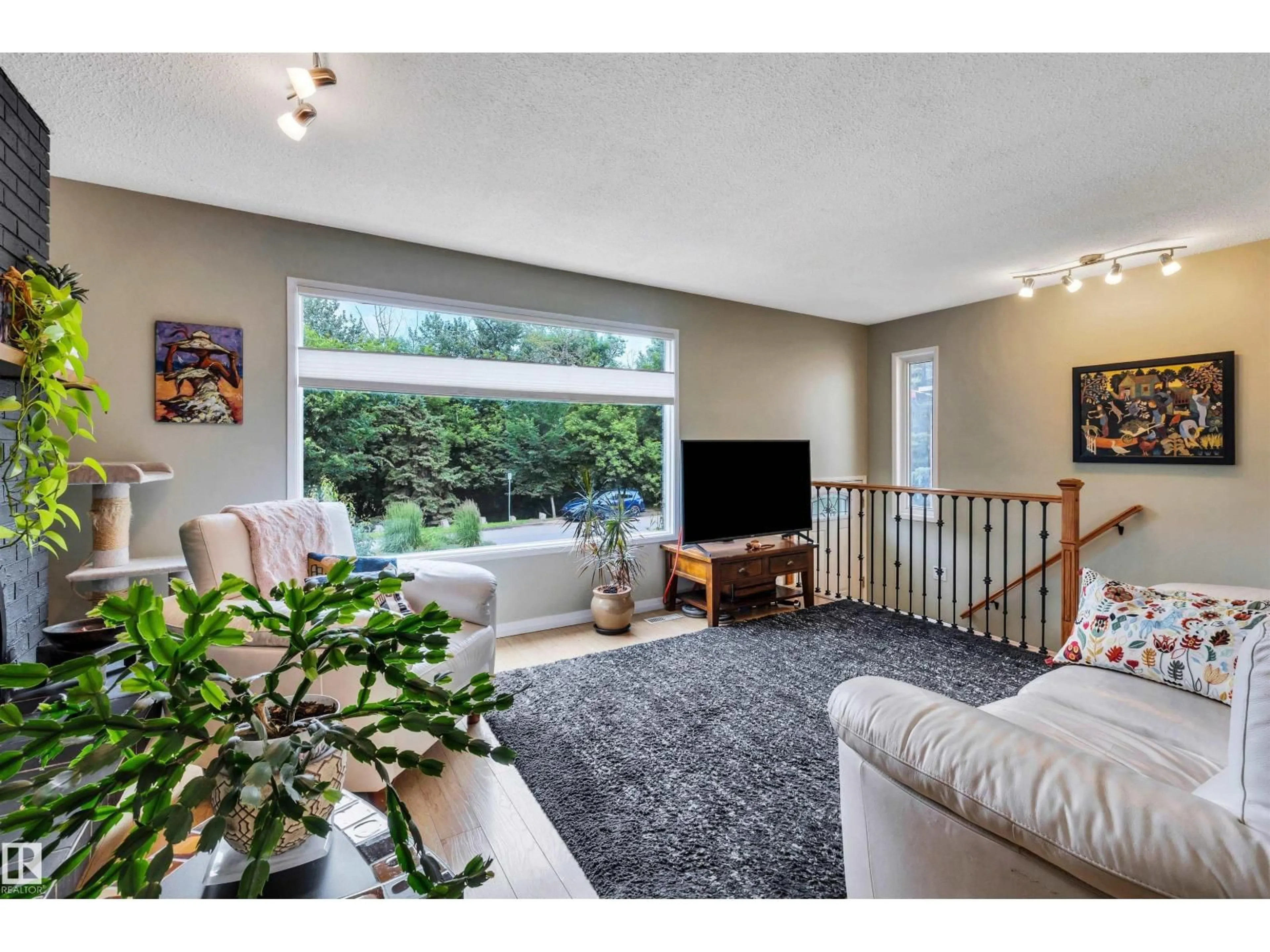 Living room with furniture, unknown for 10282 87 ST, Edmonton Alberta T5H1N6