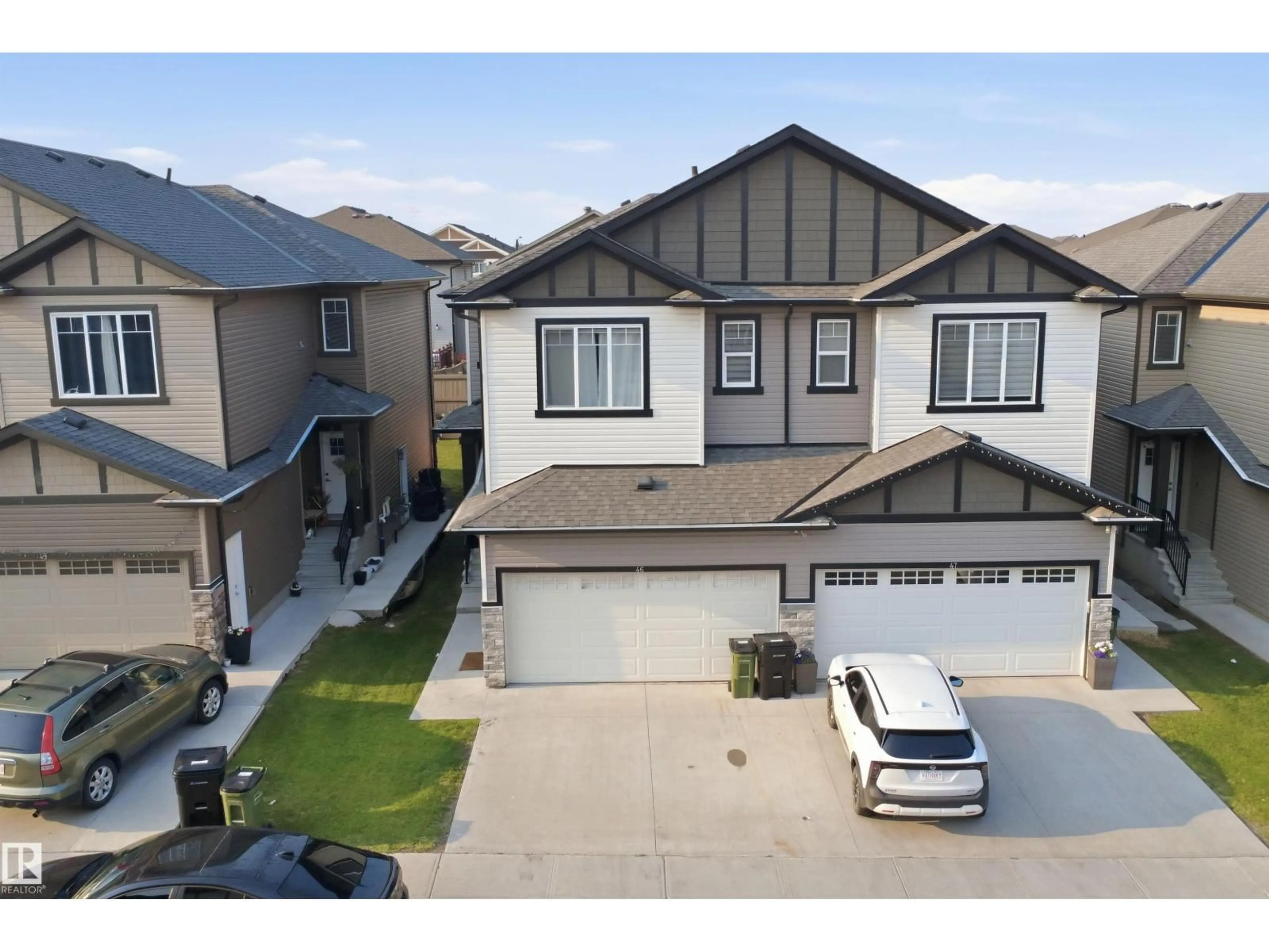 A pic from outside/outdoor area/front of a property/back of a property/a pic from drone, street for 1703 16 AV, Edmonton Alberta T6T2C3