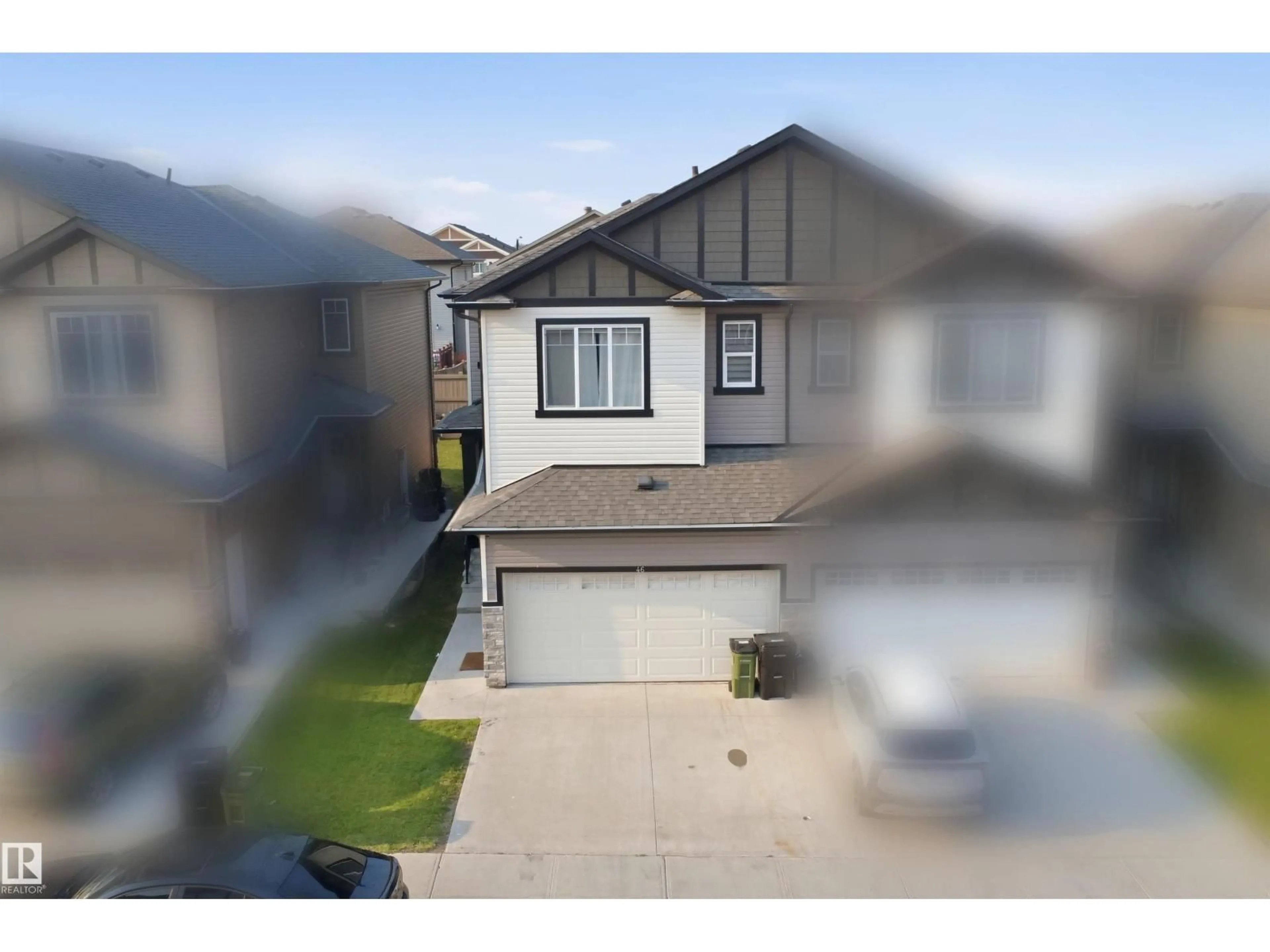 A pic from outside/outdoor area/front of a property/back of a property/a pic from drone, street for 1703 16 AV, Edmonton Alberta T6T2C3
