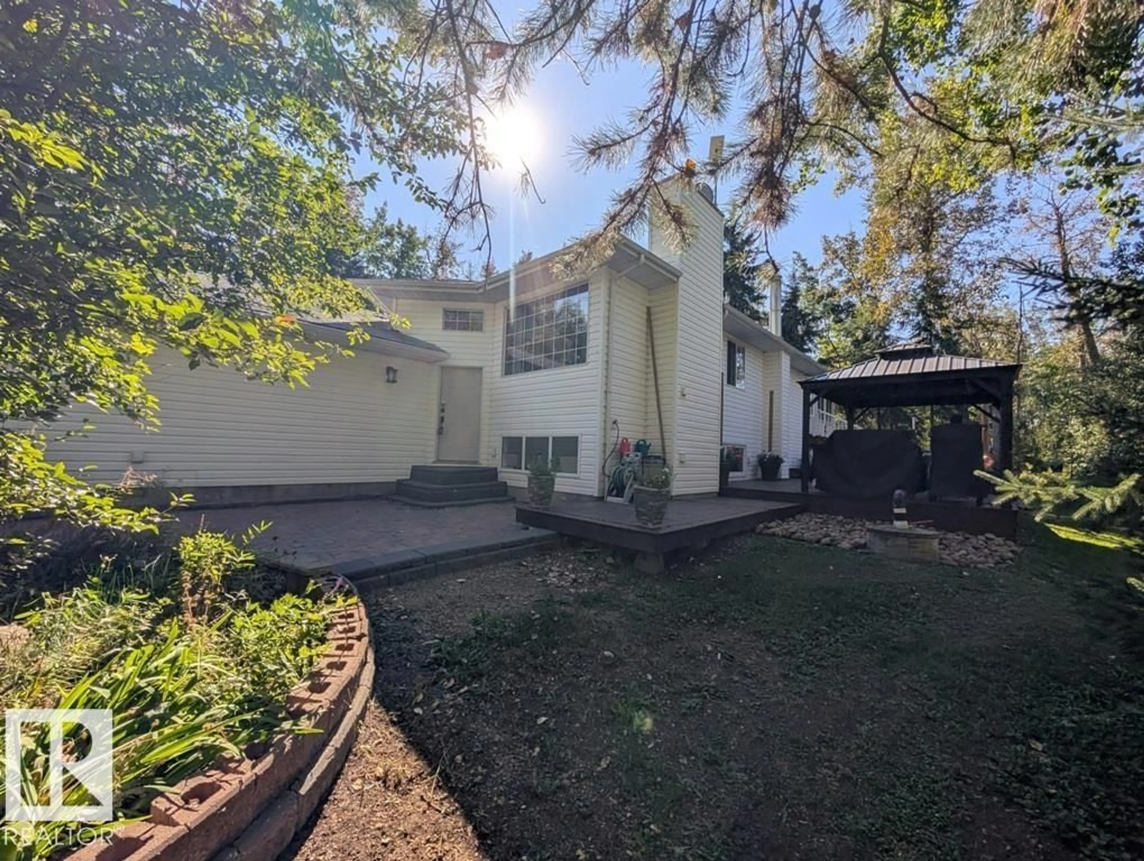 A pic from outside/outdoor area/front of a property/back of a property/a pic from drone, street for 53347 RGE ROAD 215 HWY 830, Rural Strathcona County Alberta T8E2B2