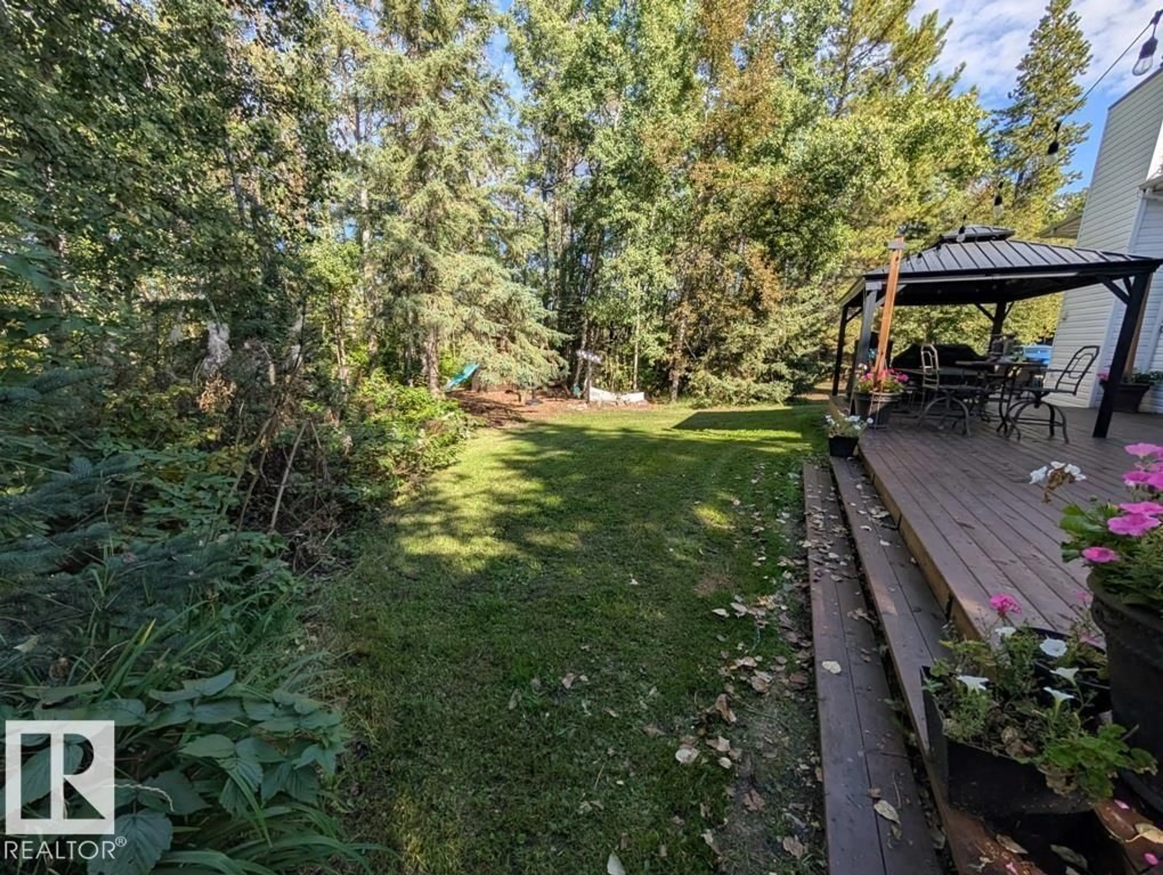 A pic from outside/outdoor area/front of a property/back of a property/a pic from drone, forest/trees view for 53347 RGE ROAD 215 HWY 830, Rural Strathcona County Alberta T8E2B2