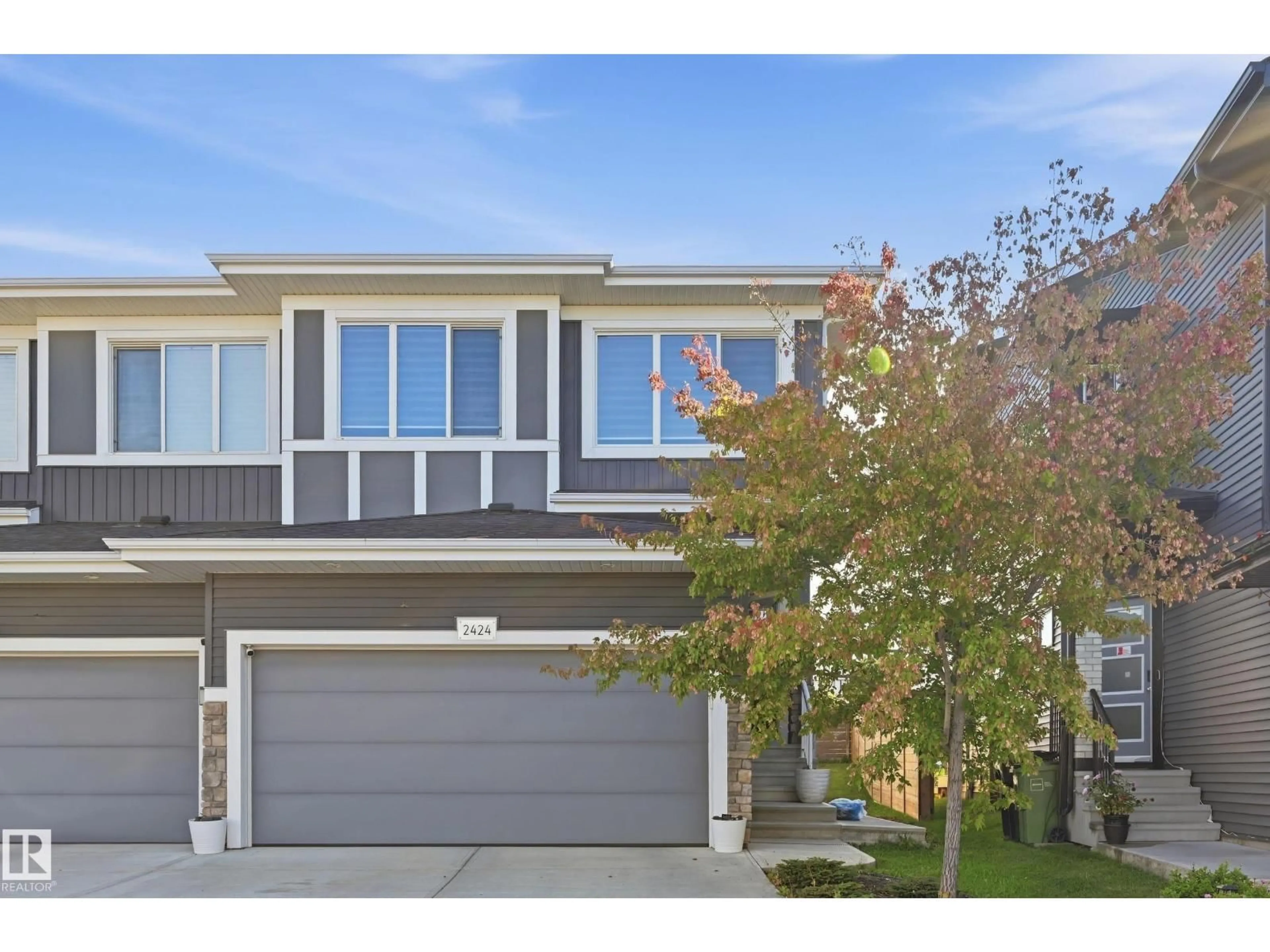 Home with vinyl exterior material, street for 2424 KELLY CI, Edmonton Alberta T6W4G3