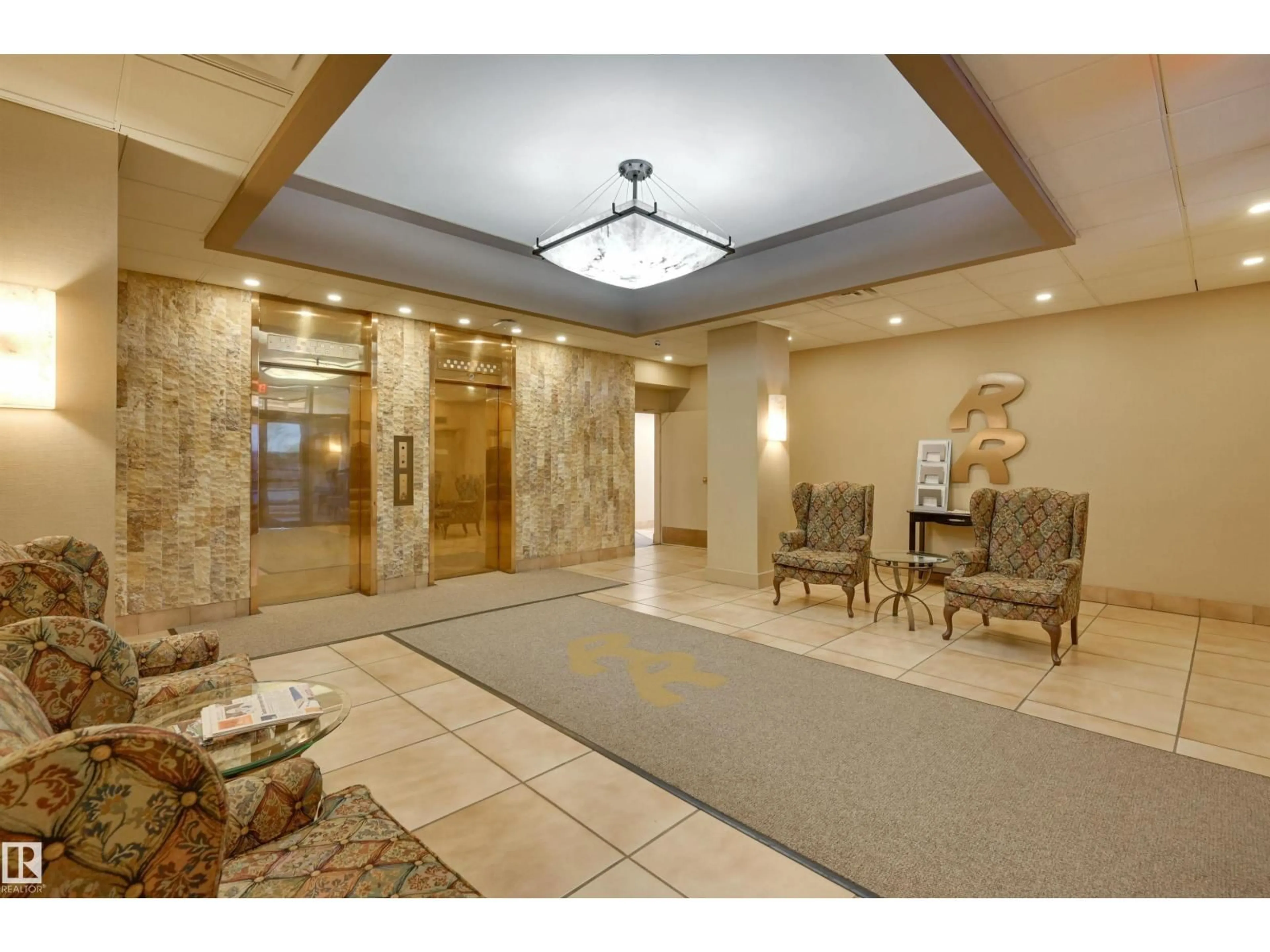 Indoor foyer for 203 - 8340 JASPER AV, Edmonton Alberta T5H4C6