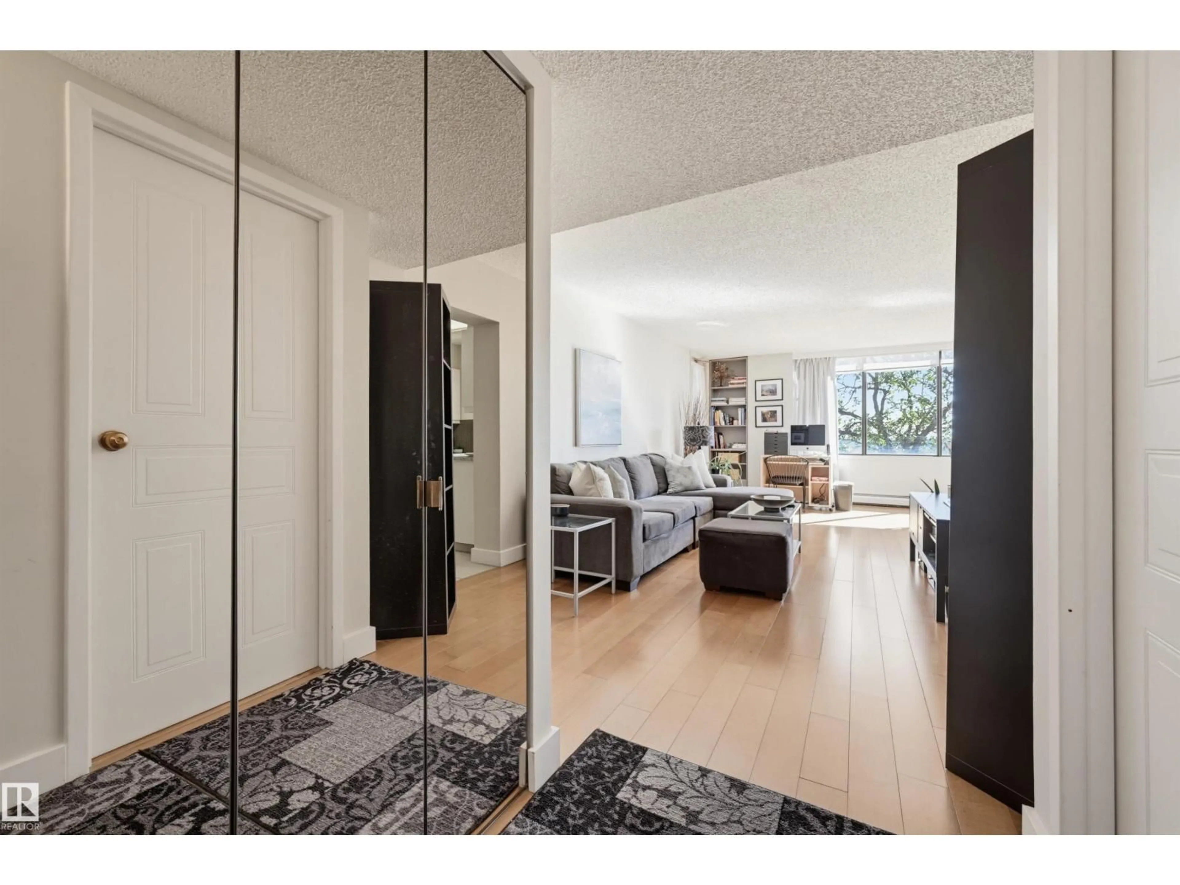 Indoor entryway for 203 - 8340 JASPER AV, Edmonton Alberta T5H4C6